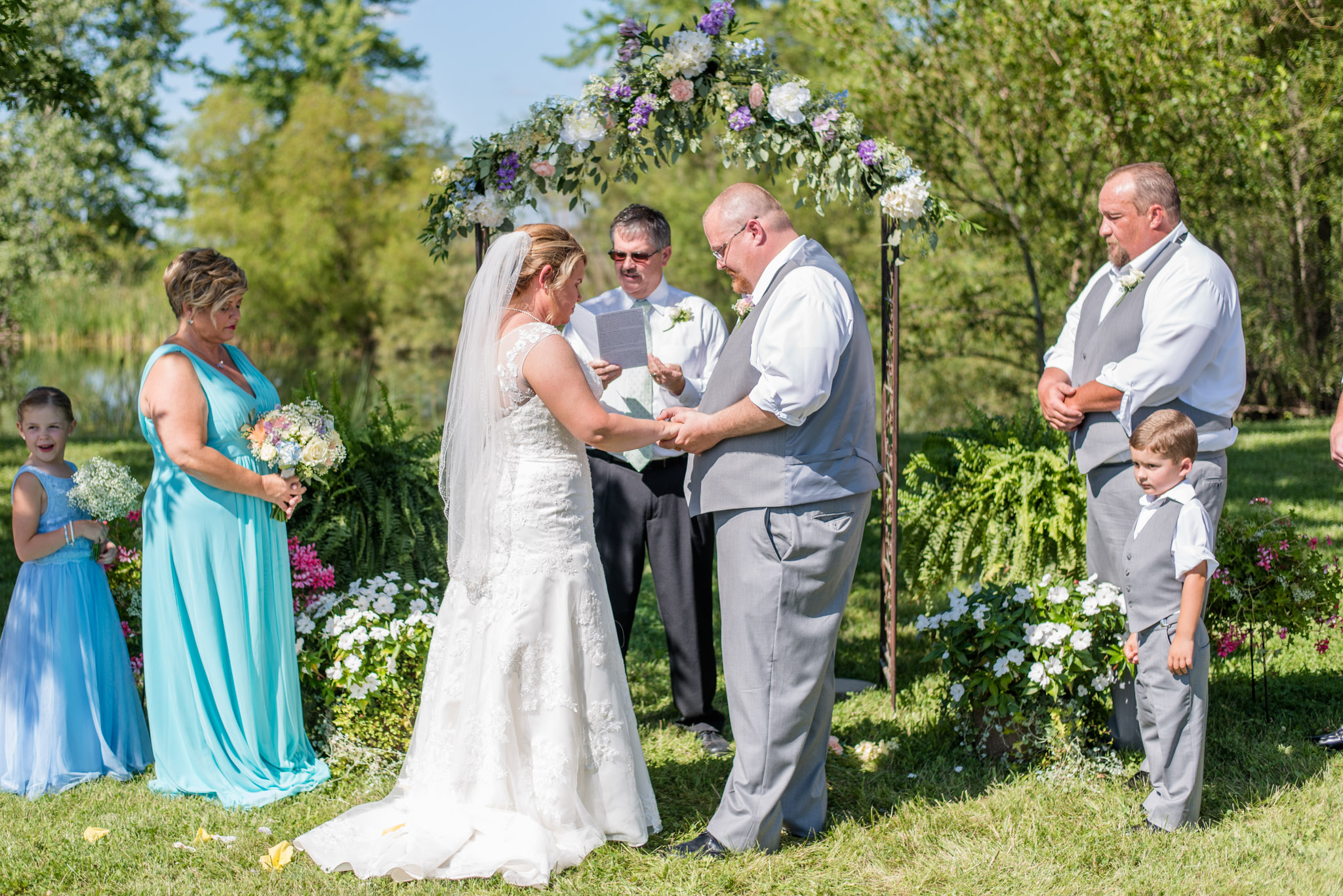 Bride and Groom Pray During Wedding Ceremony