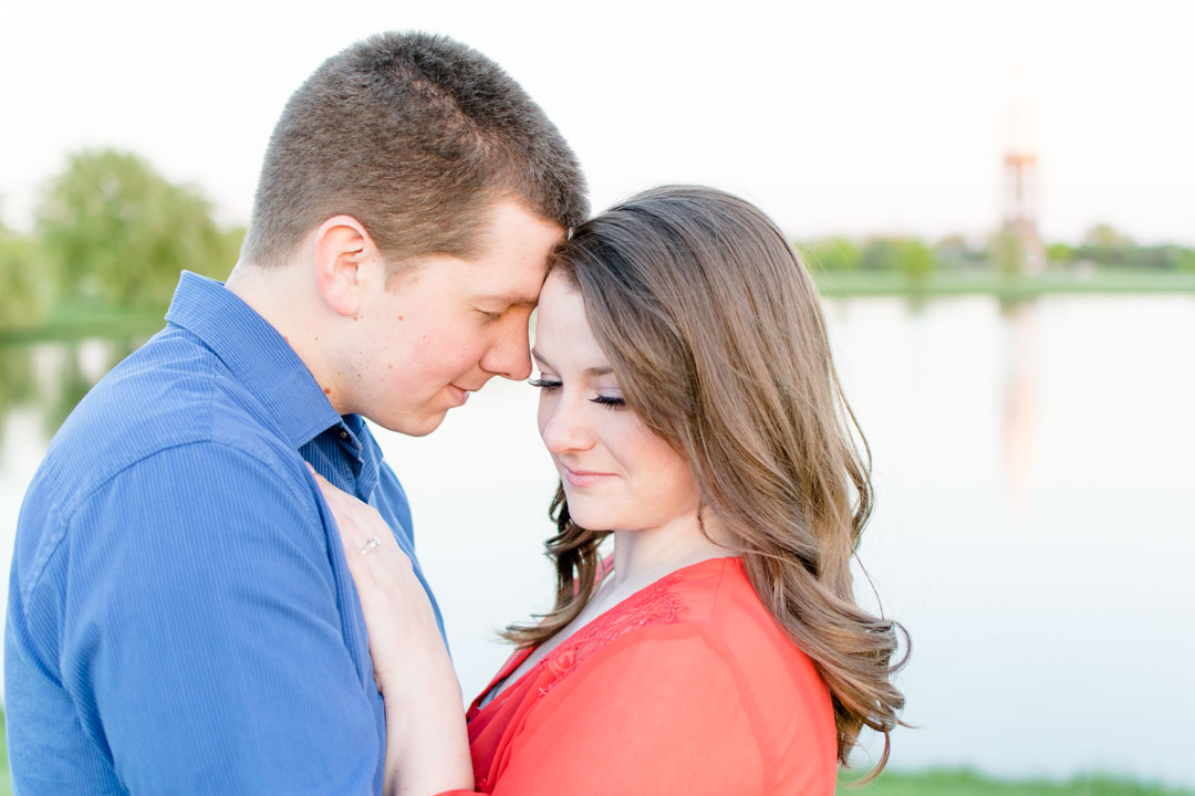 Engaged couple poses at Coxhill Gardens