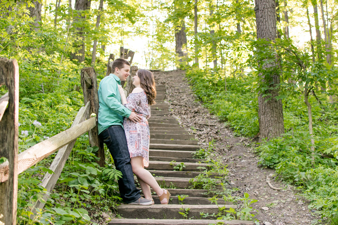 Couple poses during engagement session at Starkey Nature Park