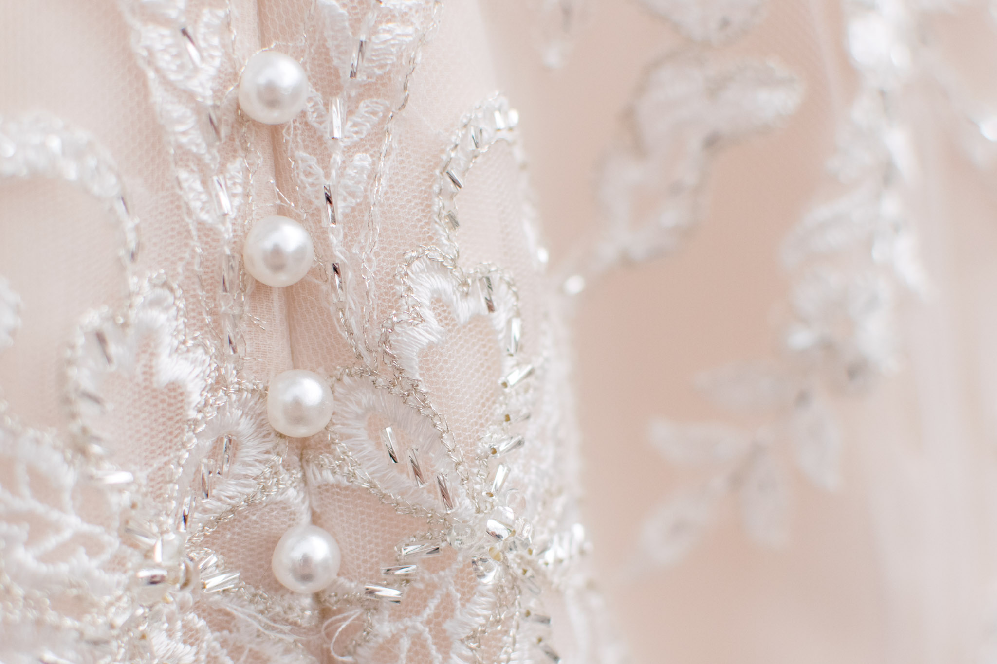 Buttons on blush wedding dress in Indianapolis