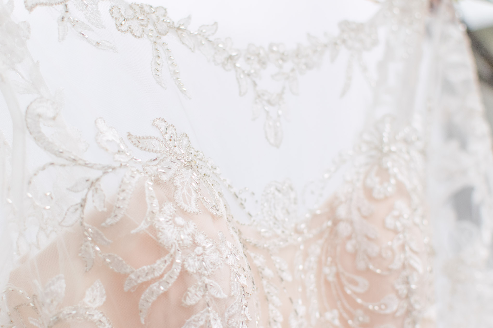 Neckline Detail on blush wedding gown in Indianapolis