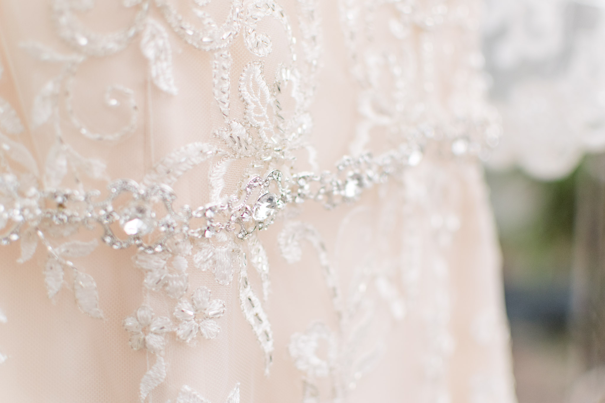 Belt detail on blush wedding gown in Indianapolis