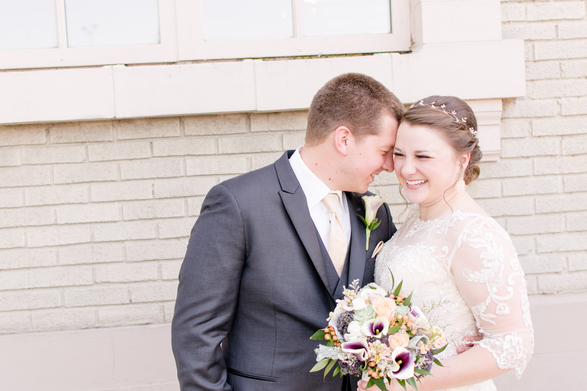 Bride laughs during wedding photos