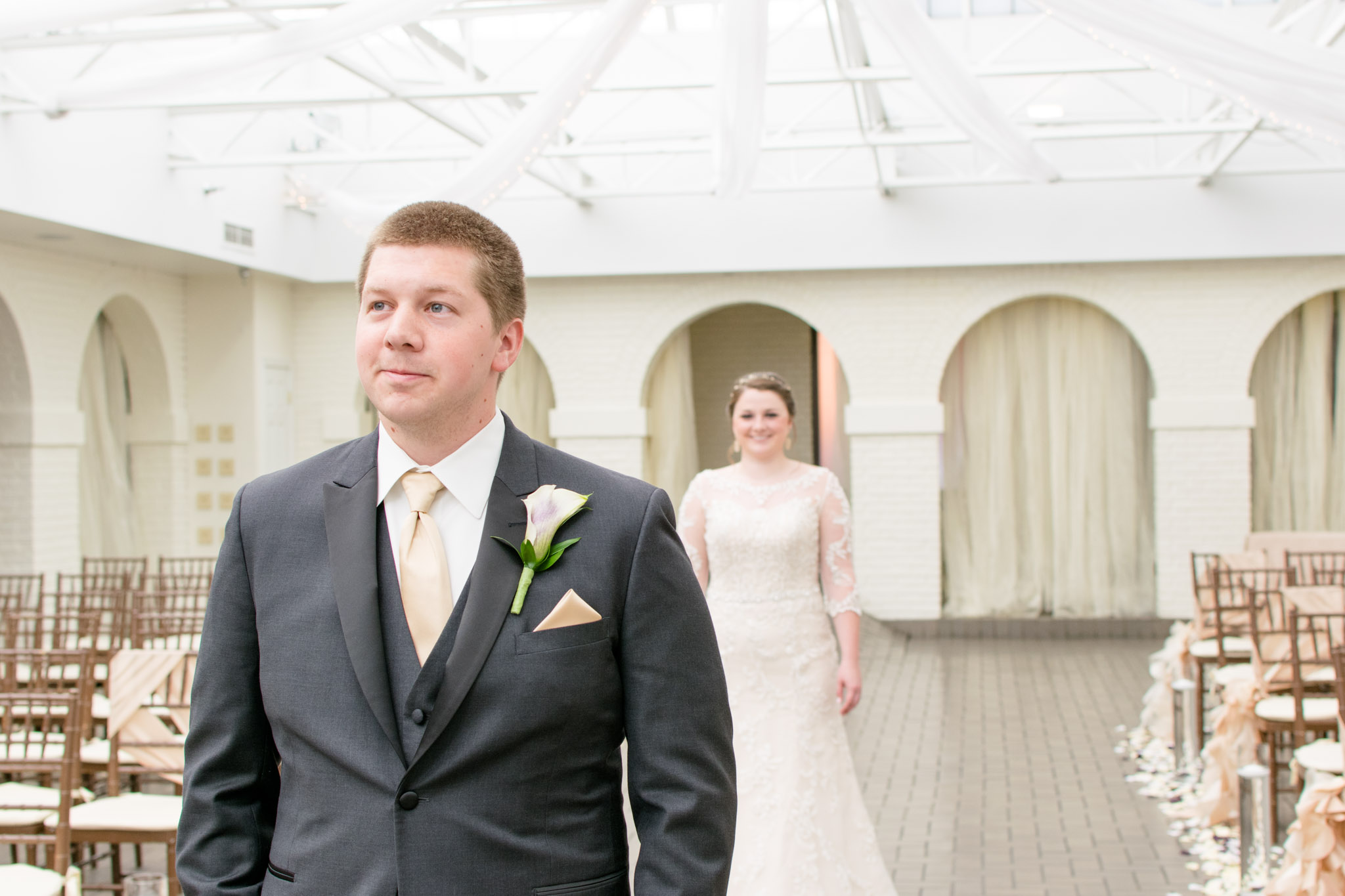 Groom waits to see bride during first look