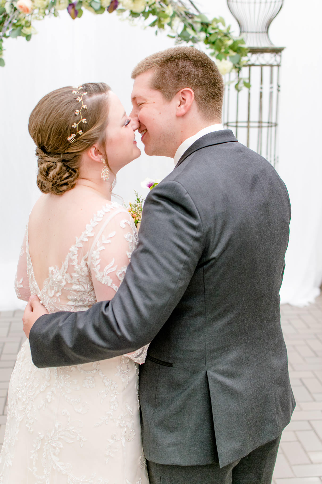 Bride and Groom kiss during pictures for their Indianapolis Wedding