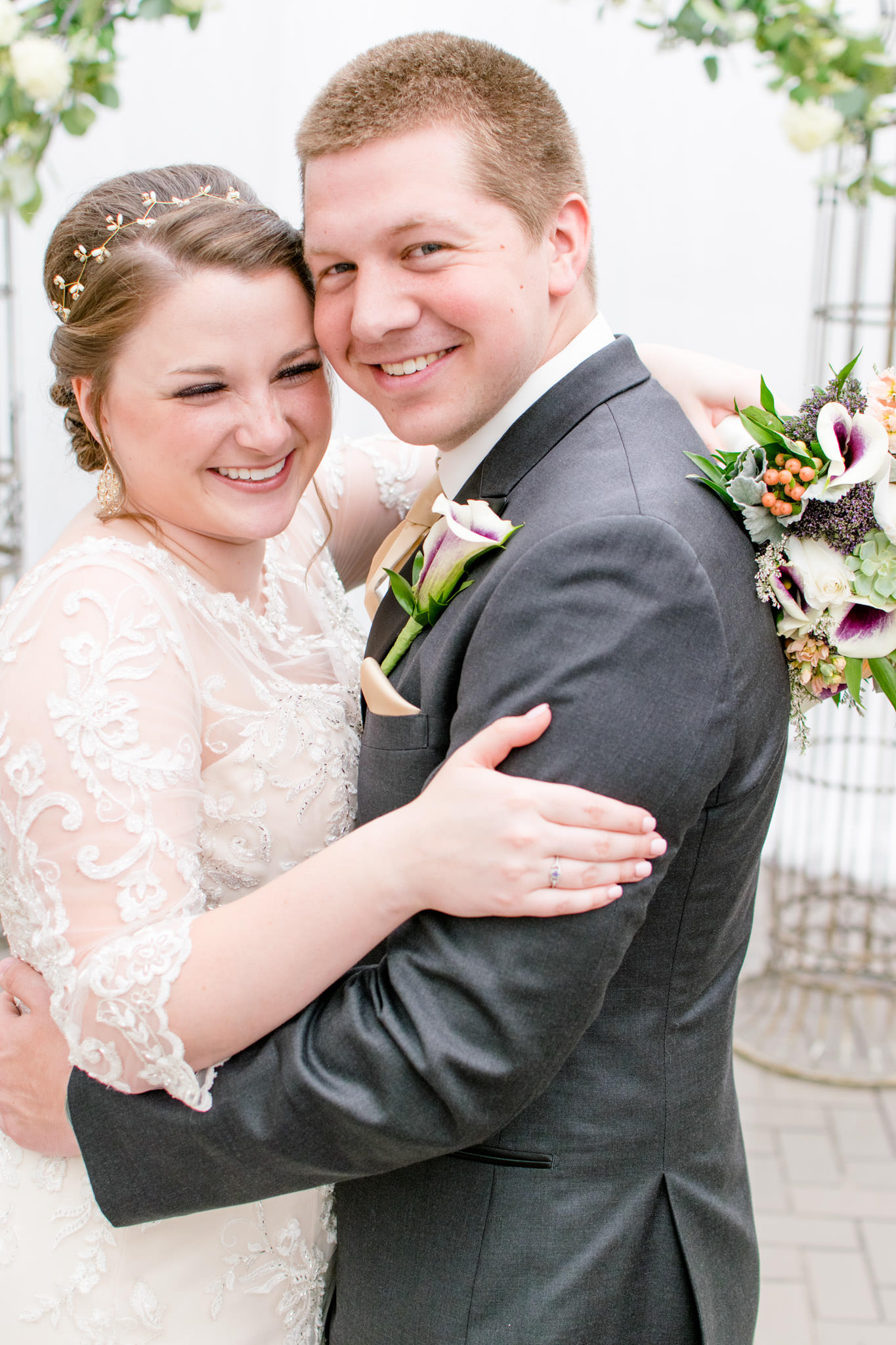 Bride and groom laugh on wedding day in Indianapolis