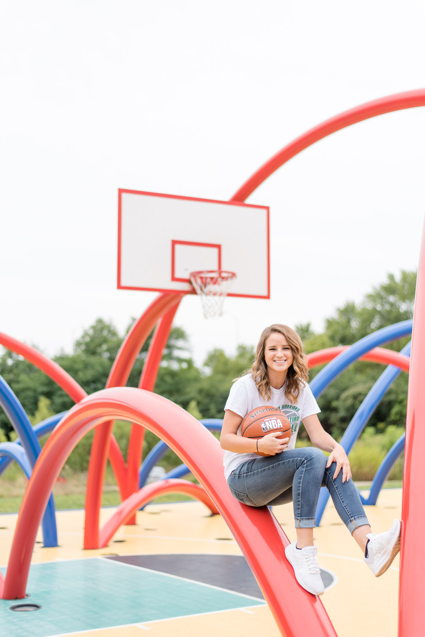 High School senior sits on basketball court in Indianapolis