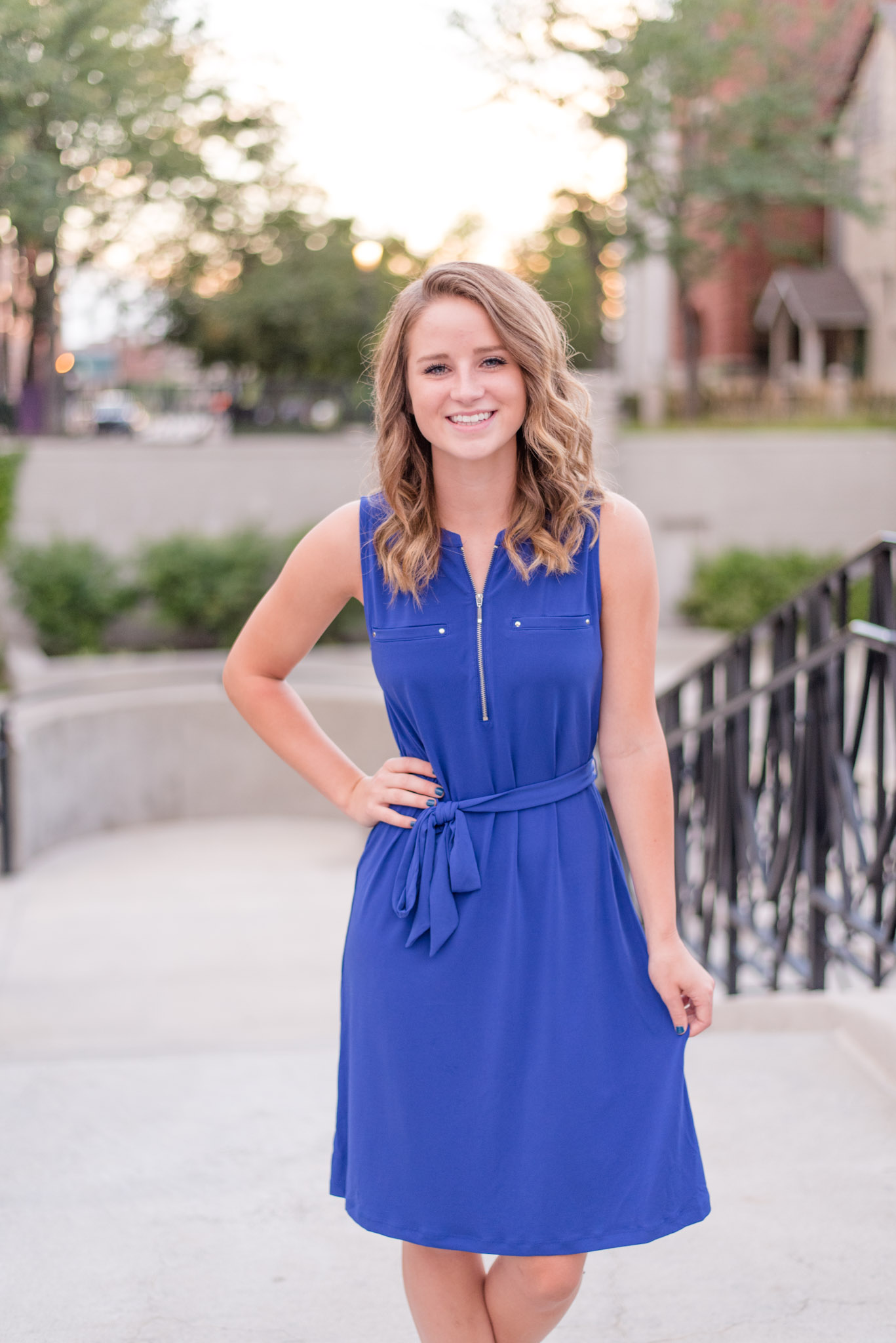 Indianapolis High School Senior smiles on bridge