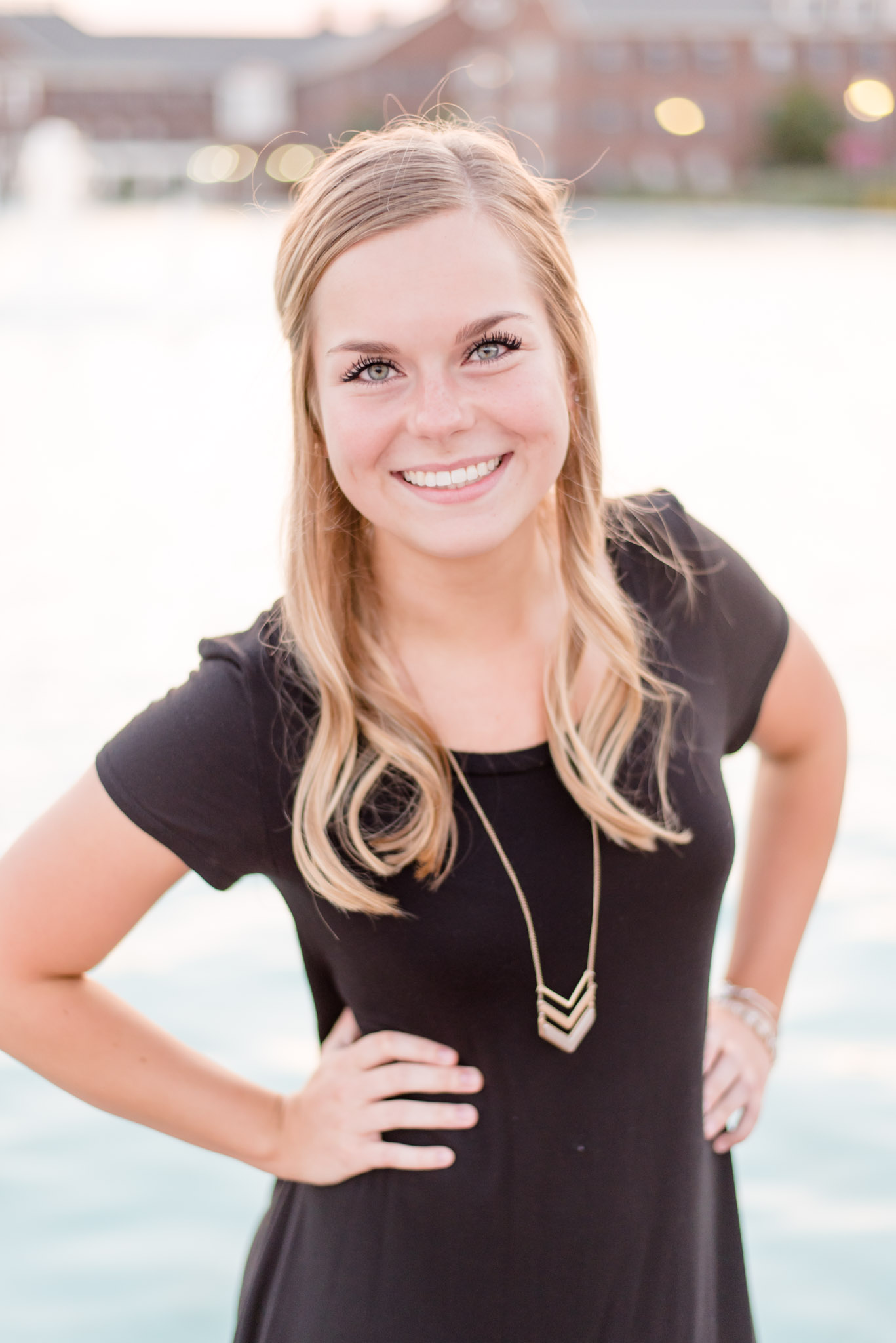 Maggie Mizell smiles for realtor portraits.