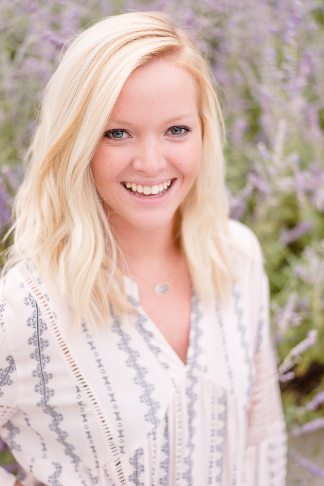 Indianapolis senior laughs in front of lavender.