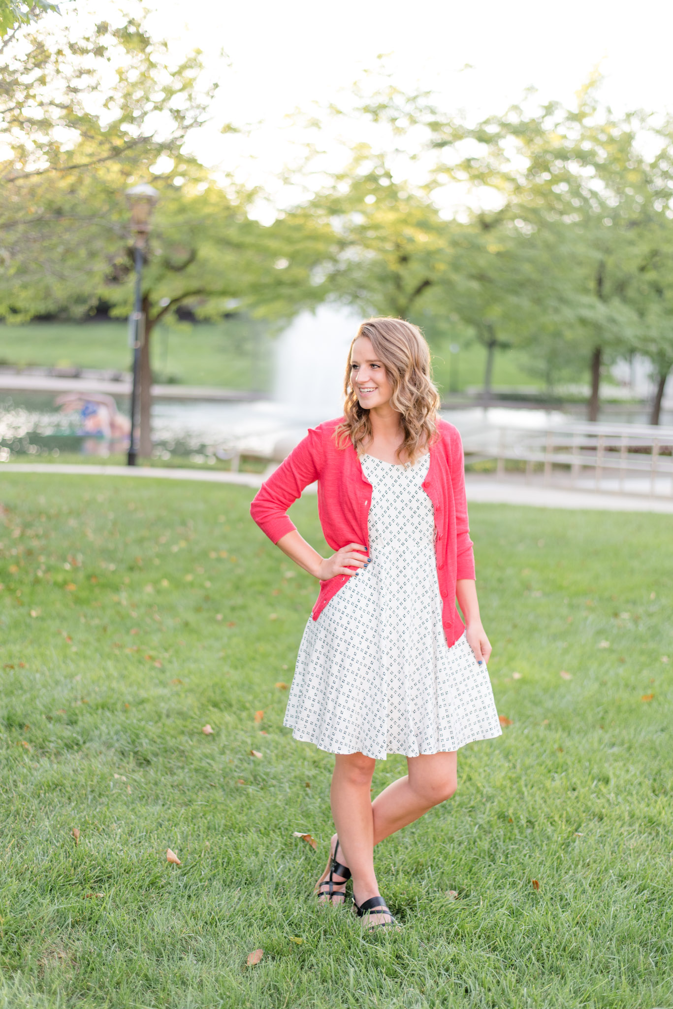 Indianapolis senior smiles over shoulder in canal walk