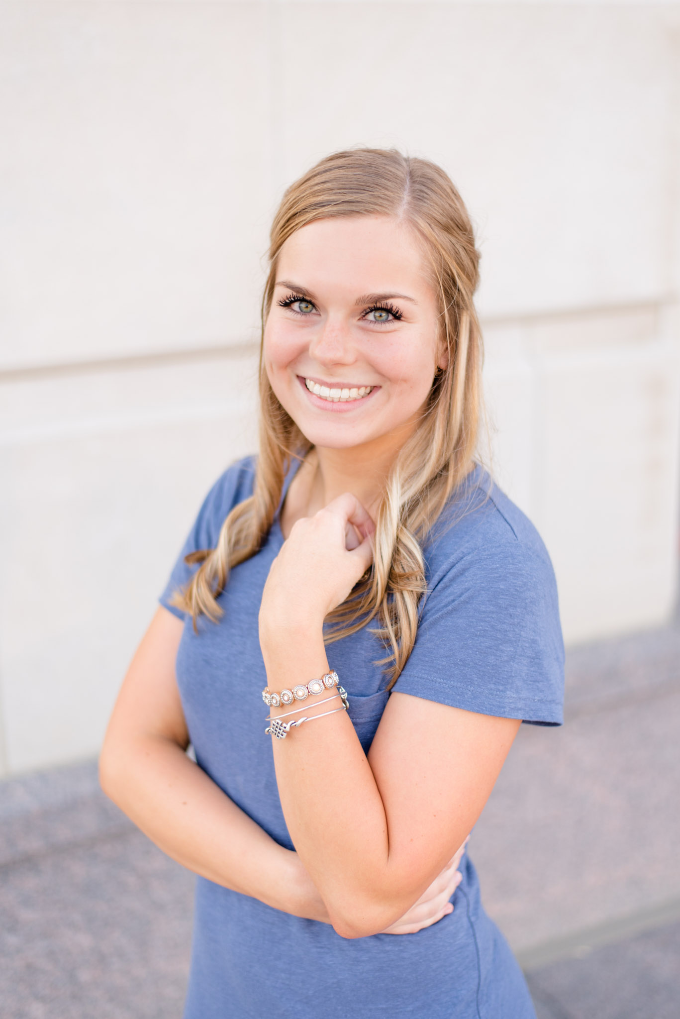 Maggie Mizell smiles at the camera.