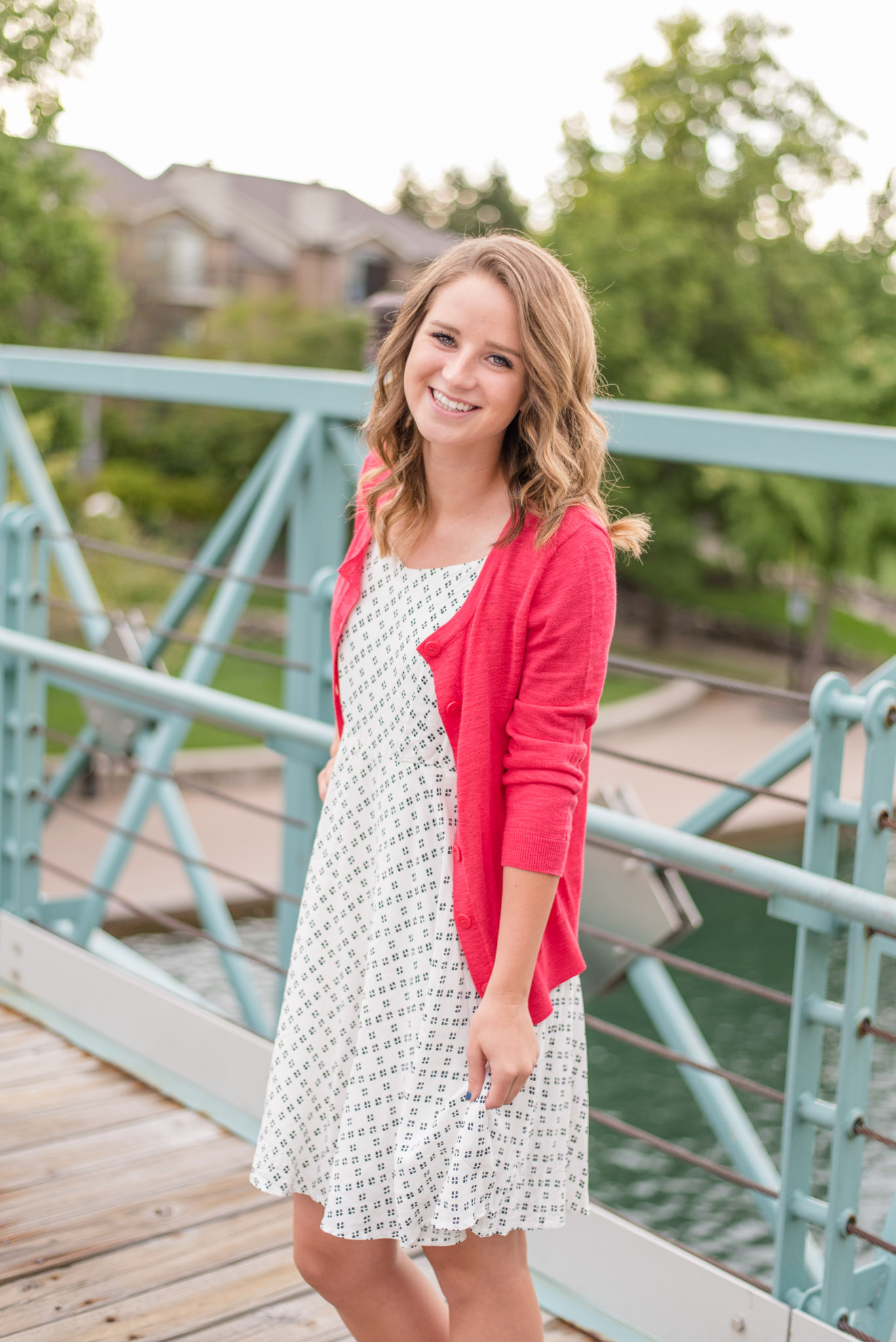 Senior laughs while on an Indianapolis canal bridge