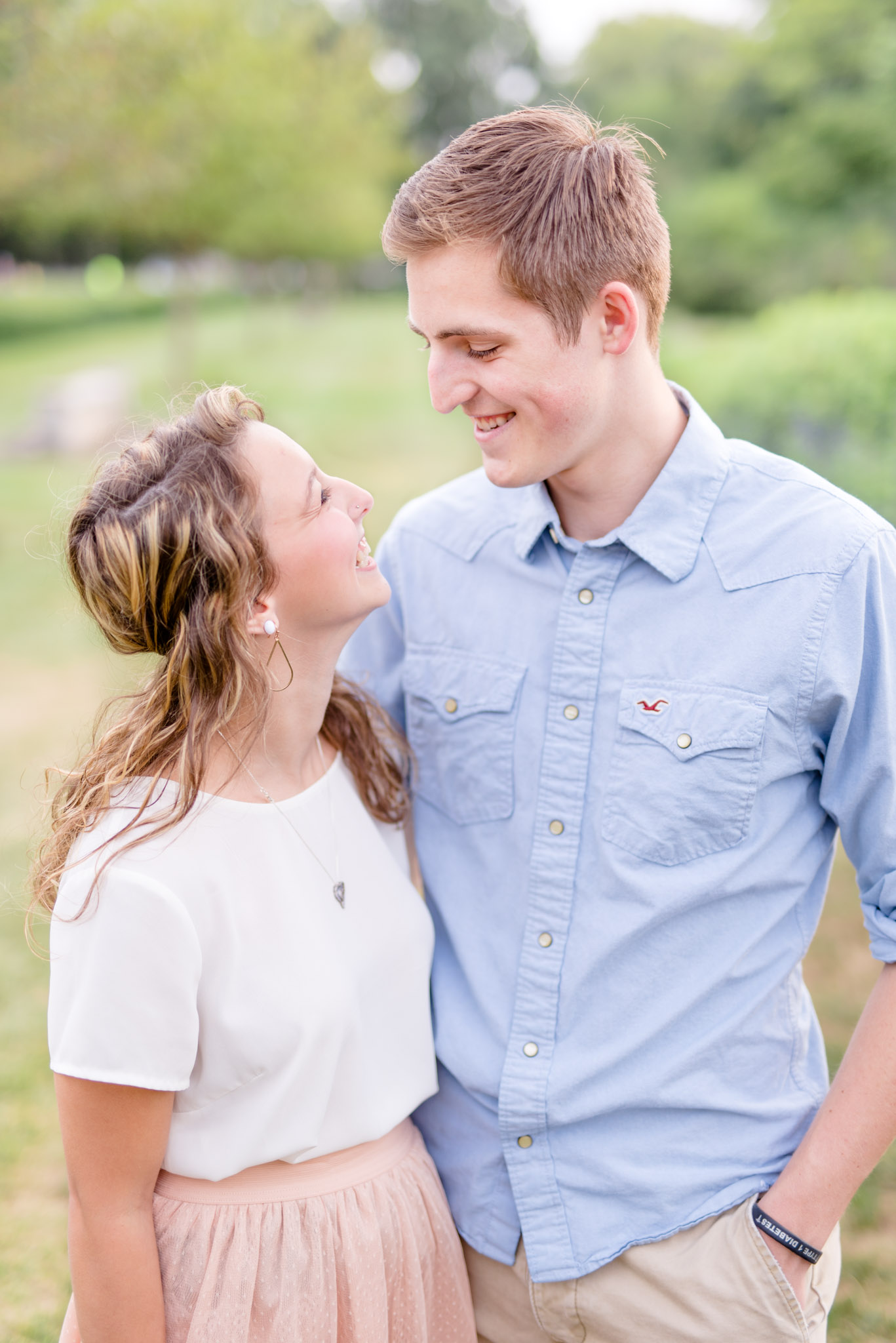 Couple smiles at each other at Butler University.