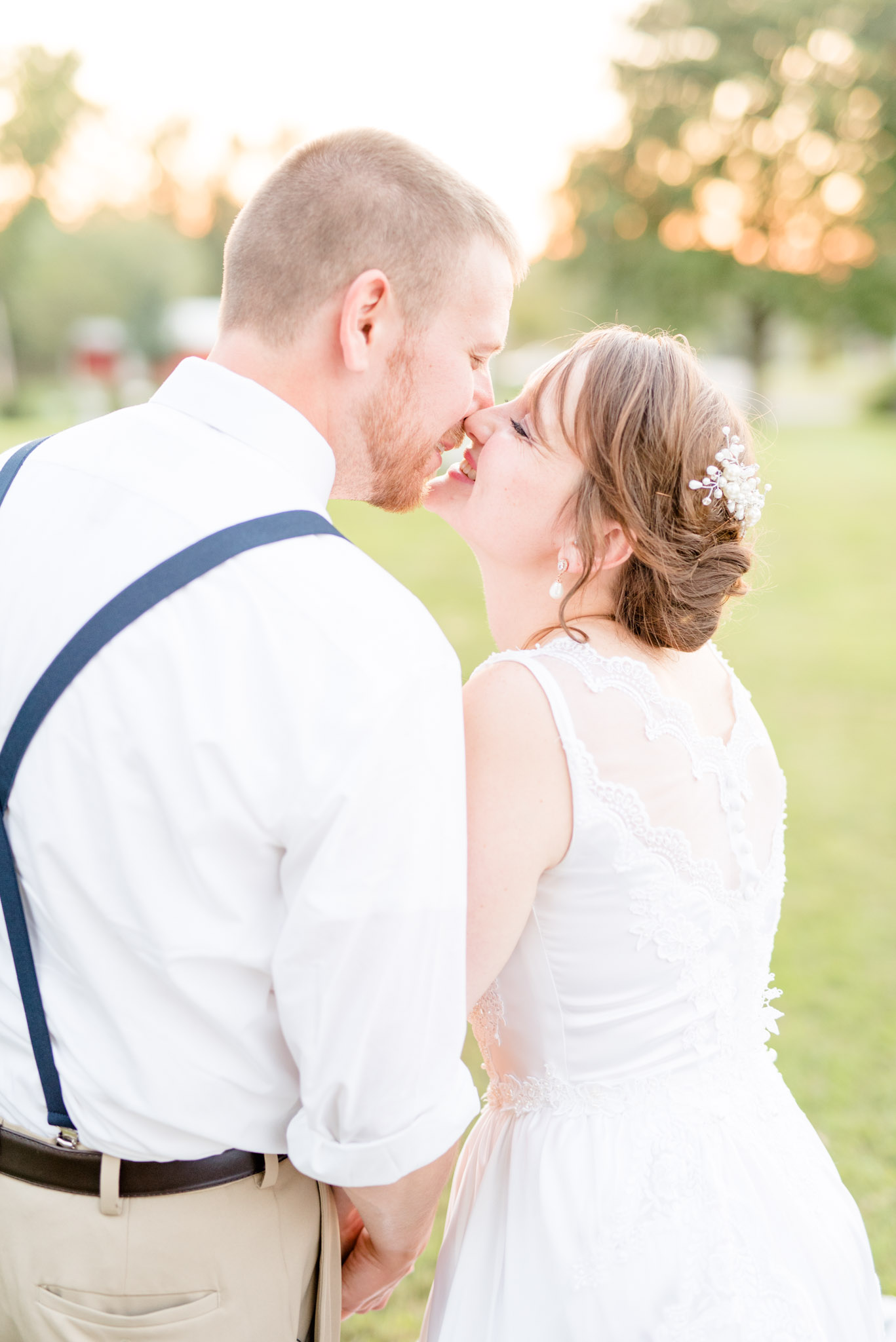 Bride and Groom Kiss at Sunset