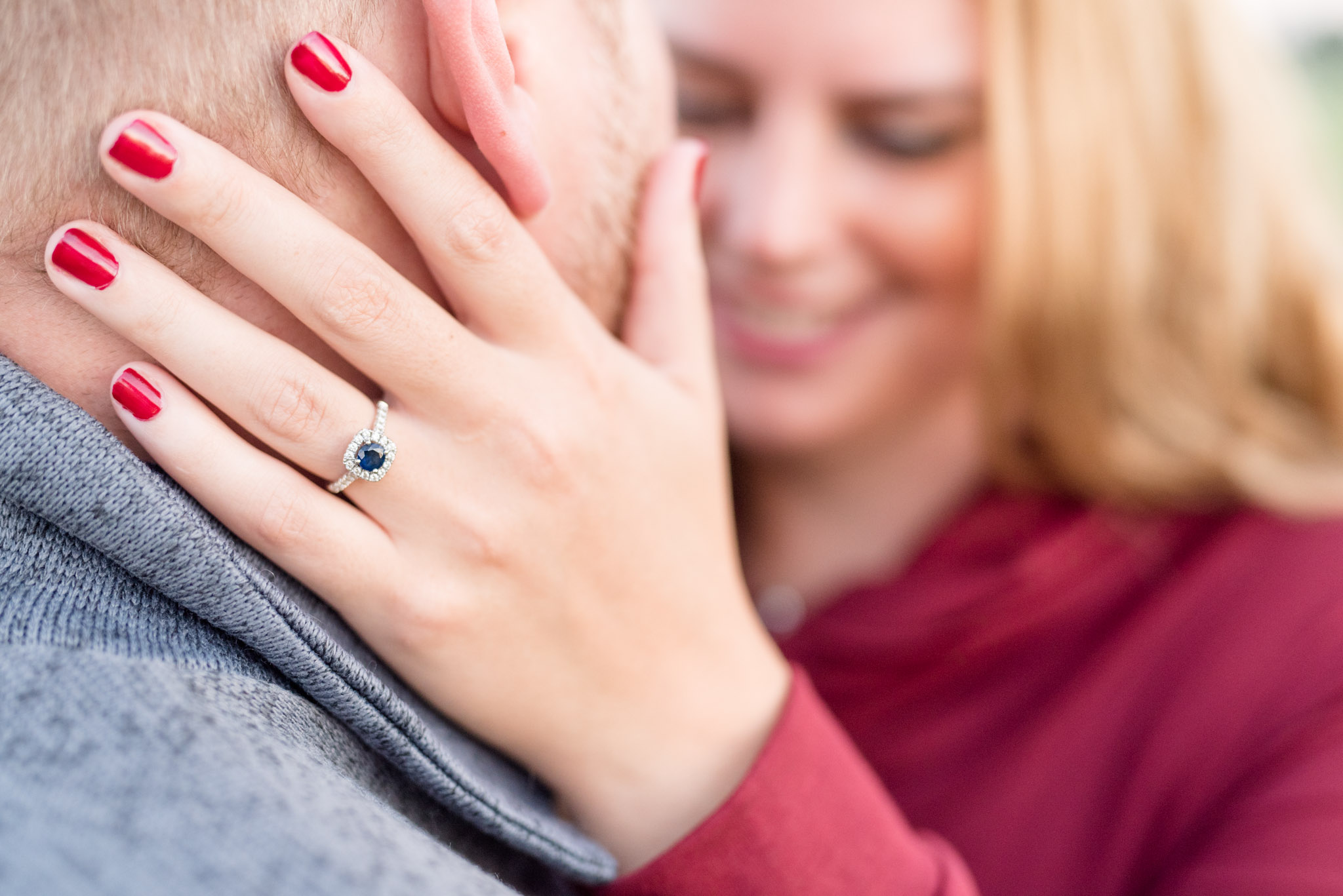 Engagement ring on bride's hand.
