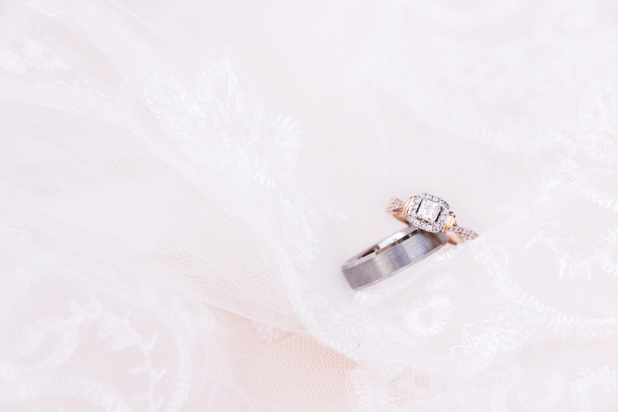 Engagement Ring and Wedding Band in Bridal Veil.