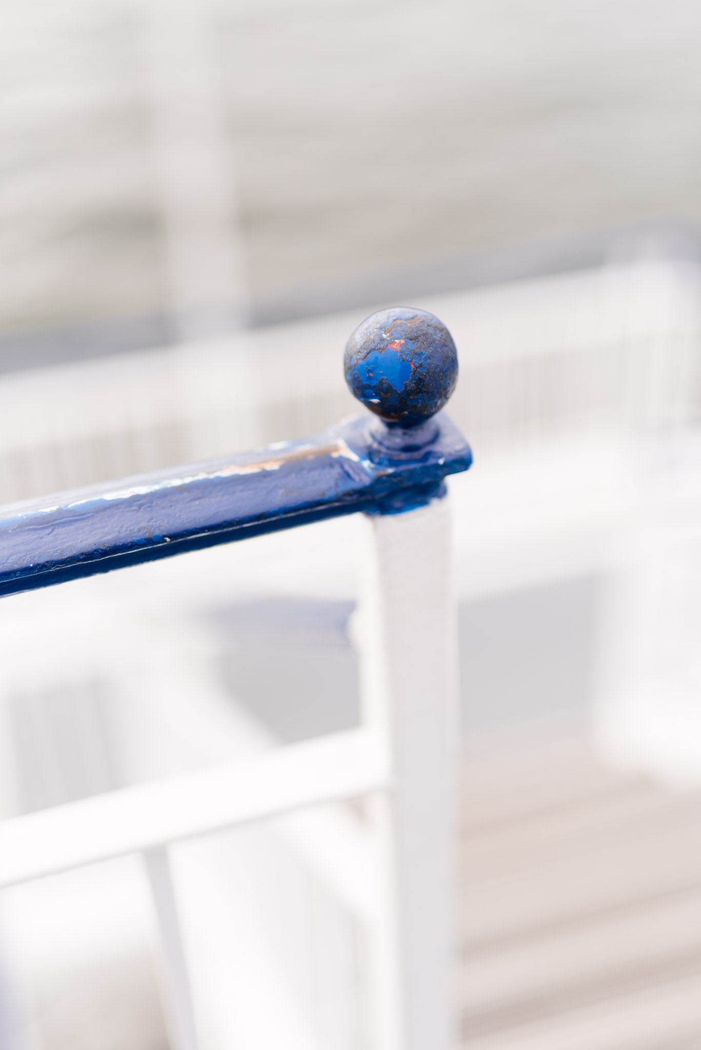 Blue and white railing of boat