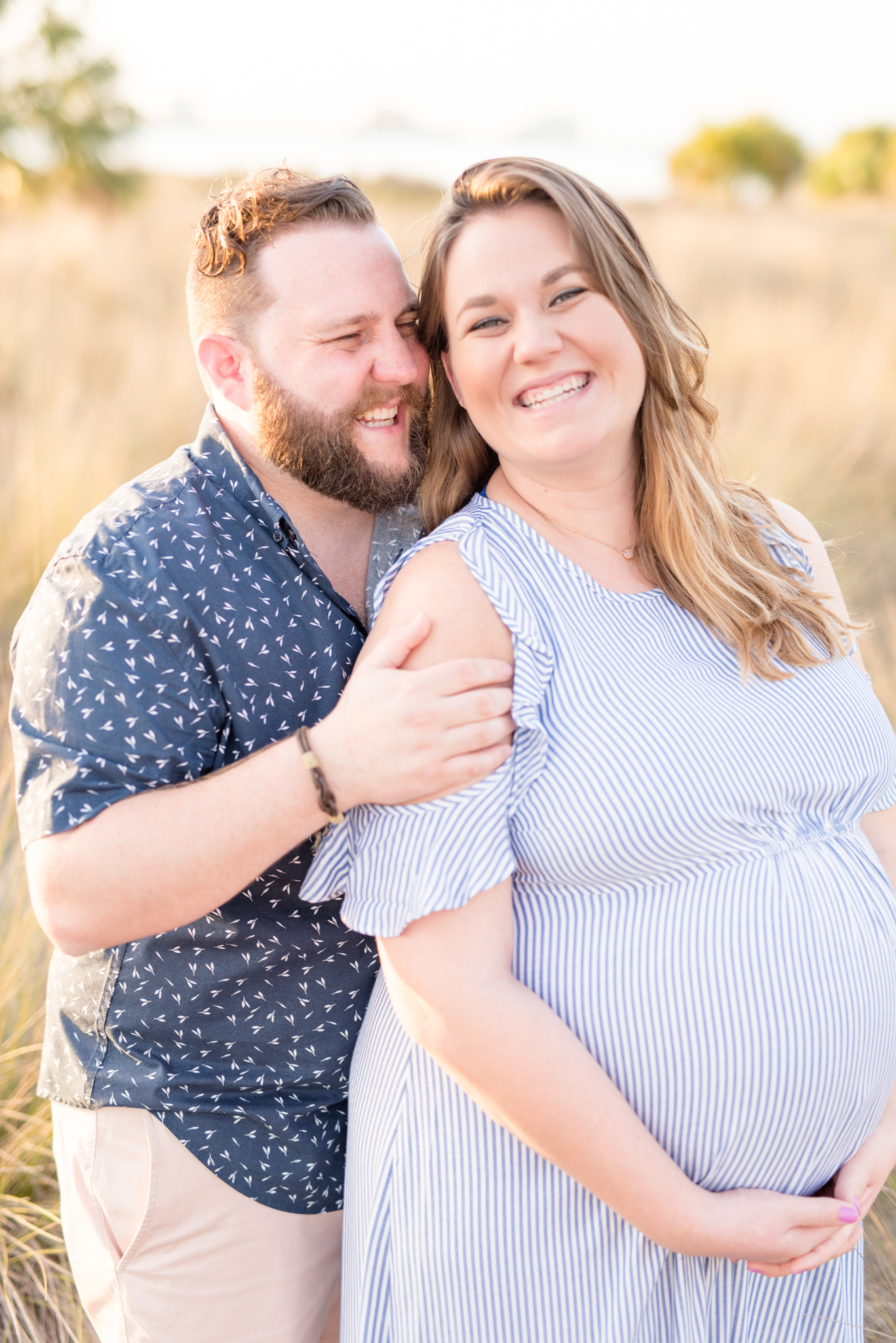 Couple expecting twins laughs at Cypress Point Park