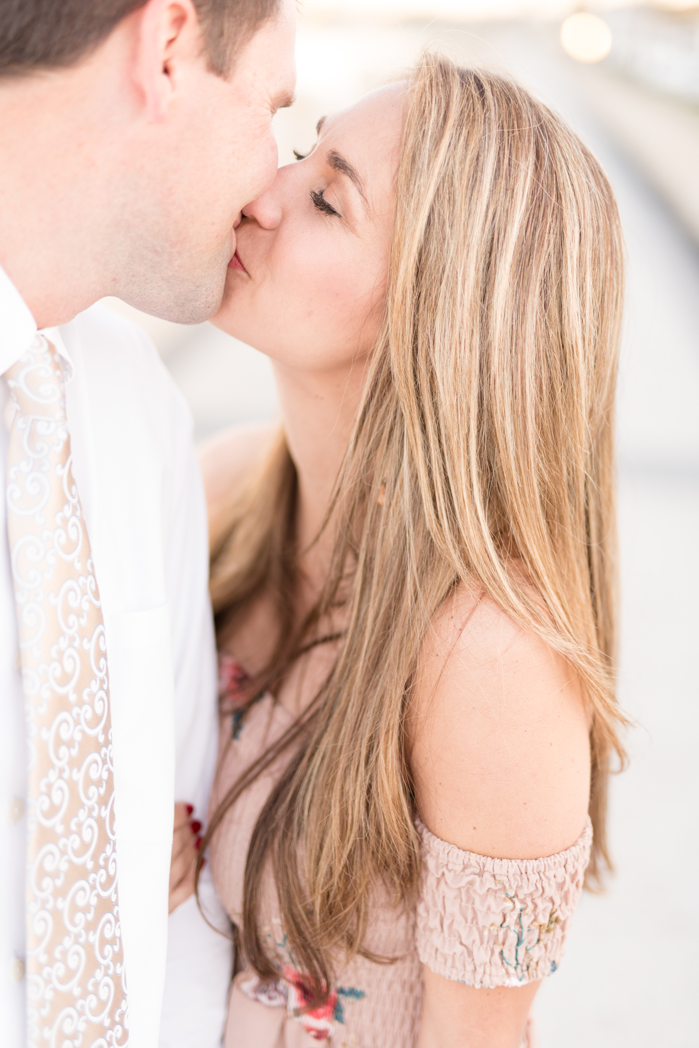 Married couple kiss.