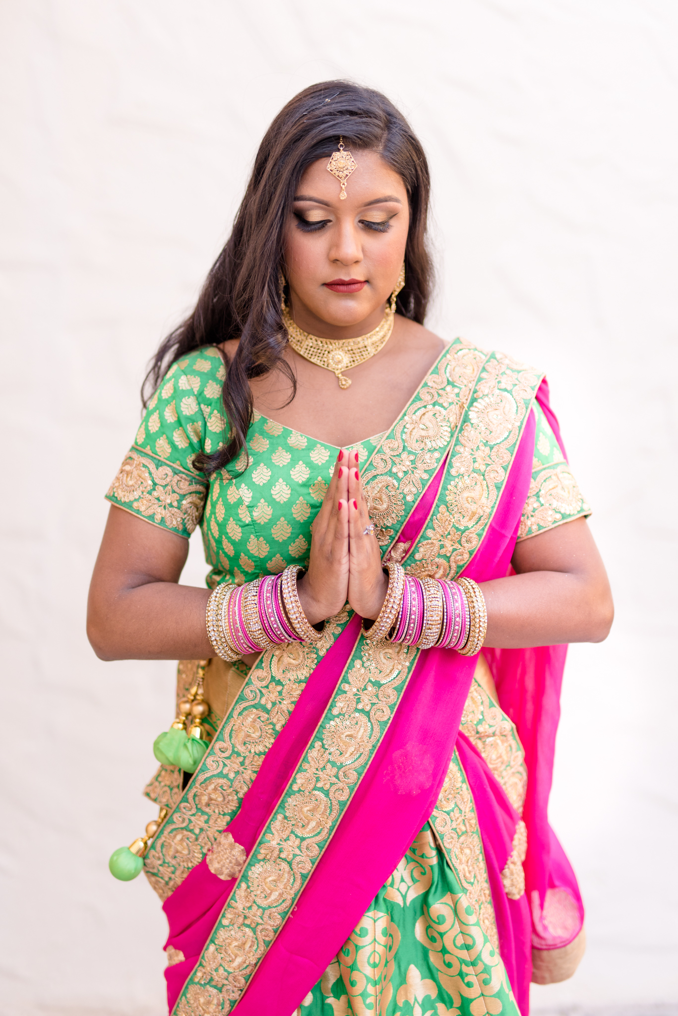 Engaged woman in traditional Indian attire.