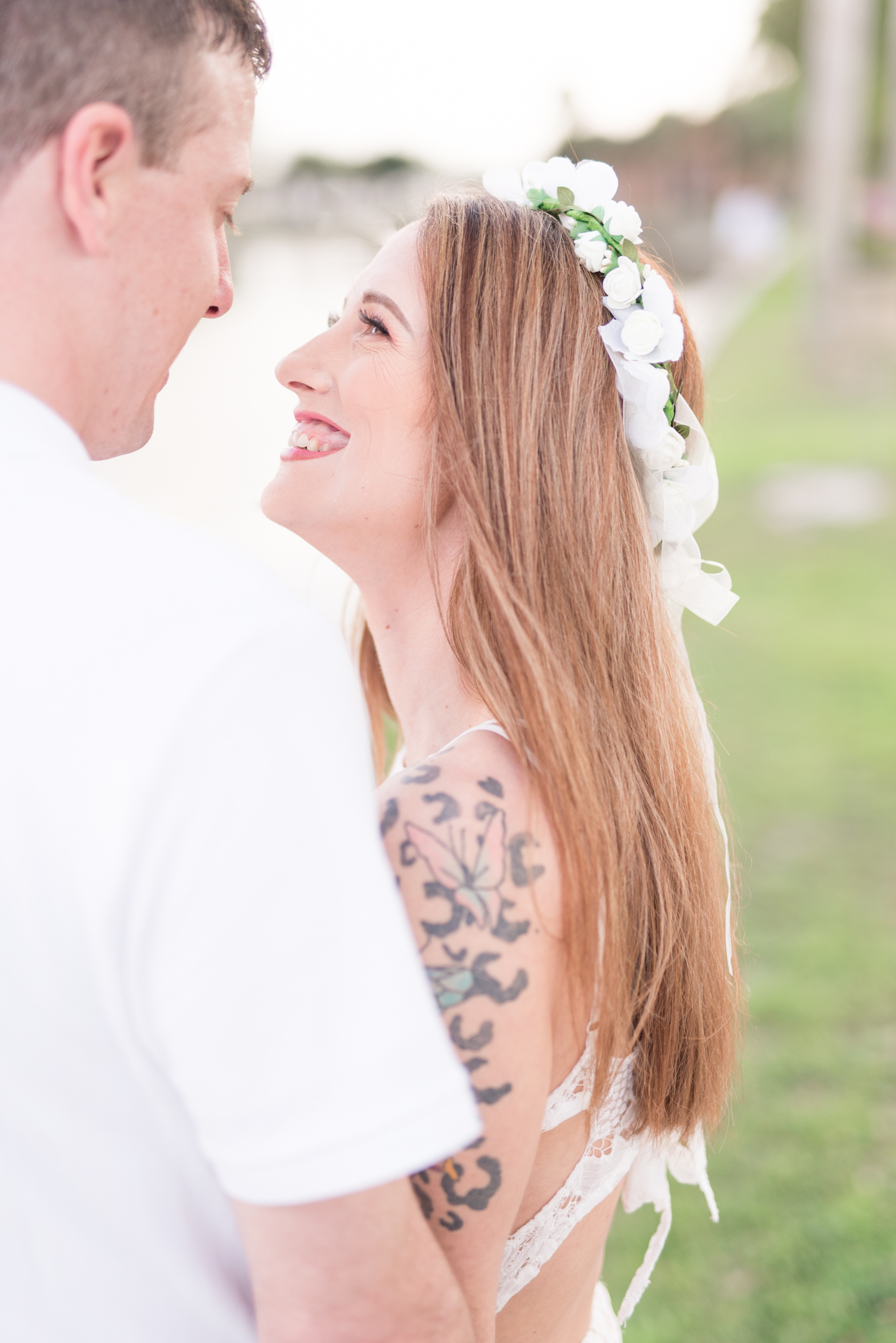 Man and woman smile at each other at North Straub Park