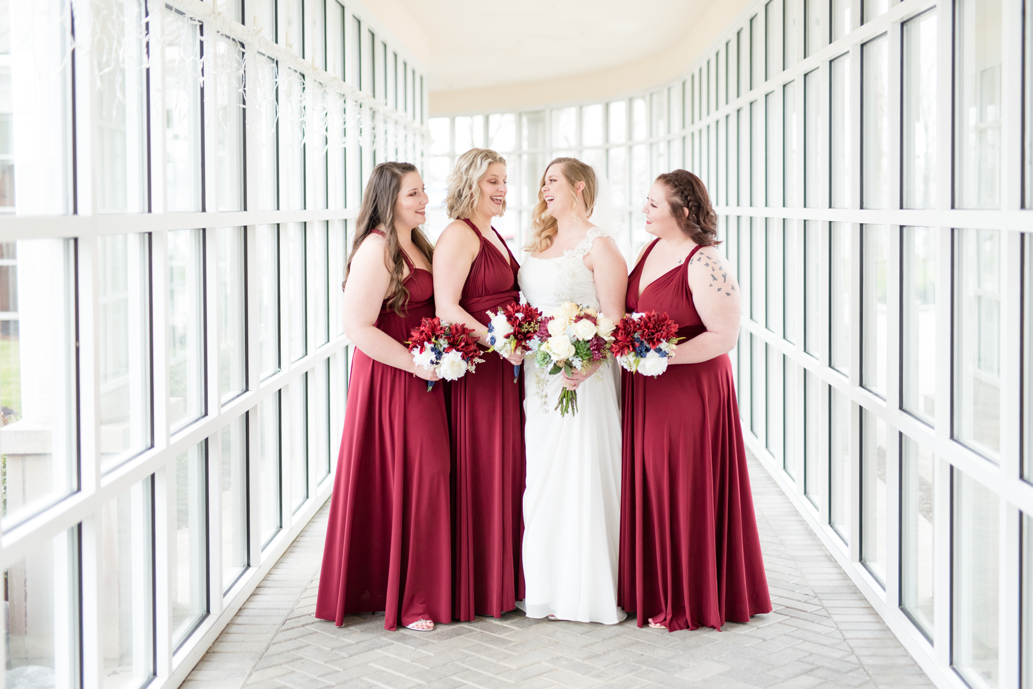 Bridal party laughs together
