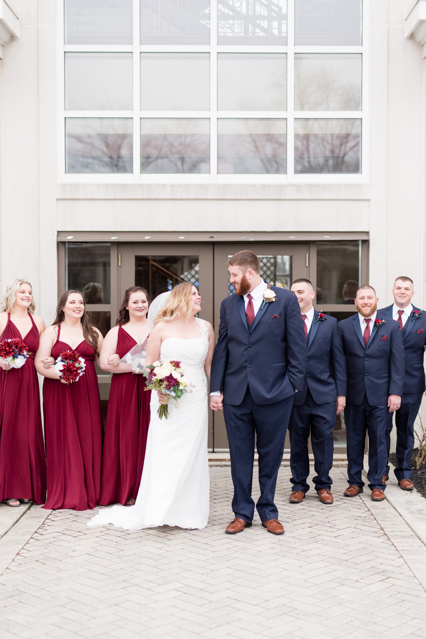 Wedding Party stands together on wedding day.