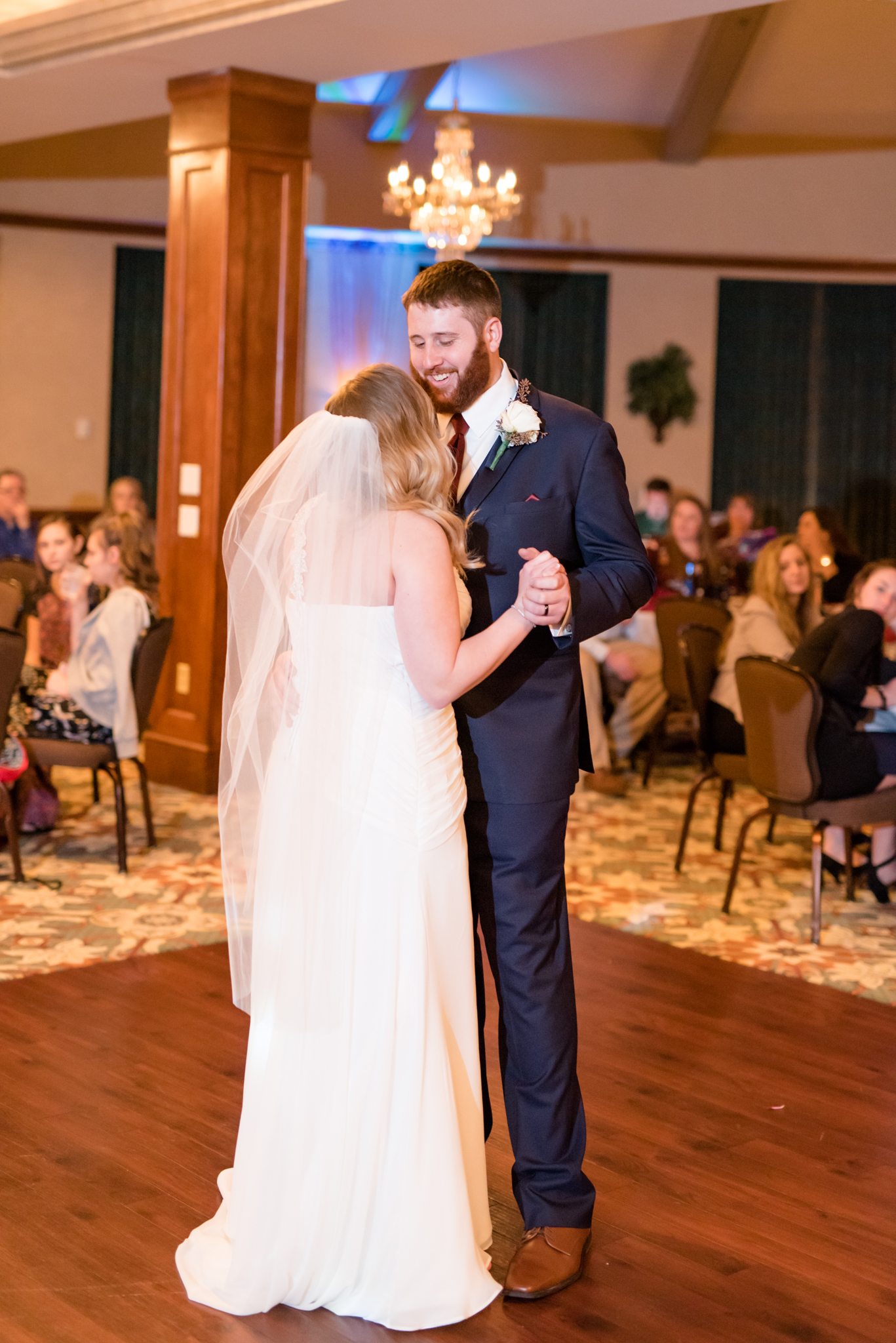 Bride and groom dance.