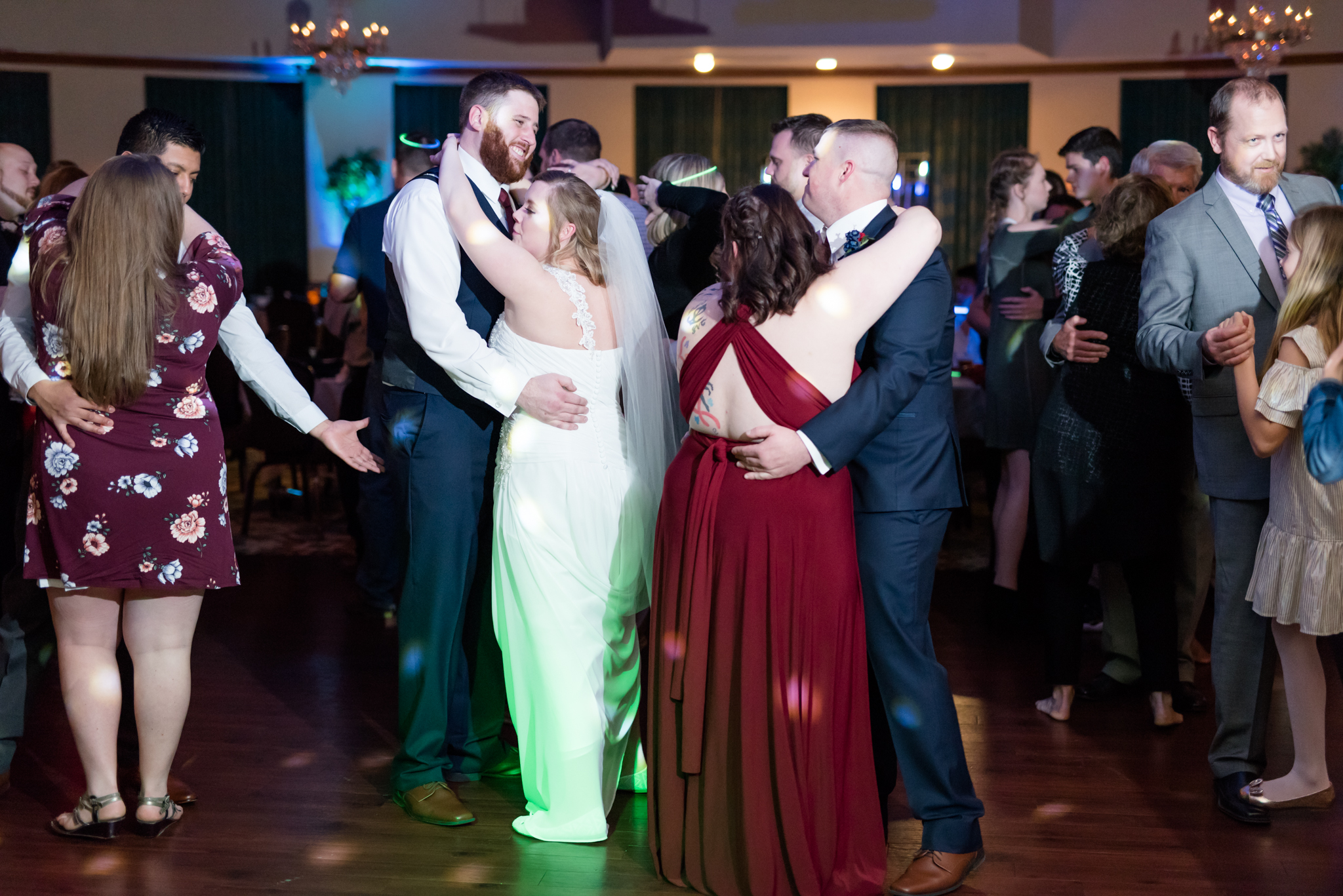 Bride and groom dance with their guests.