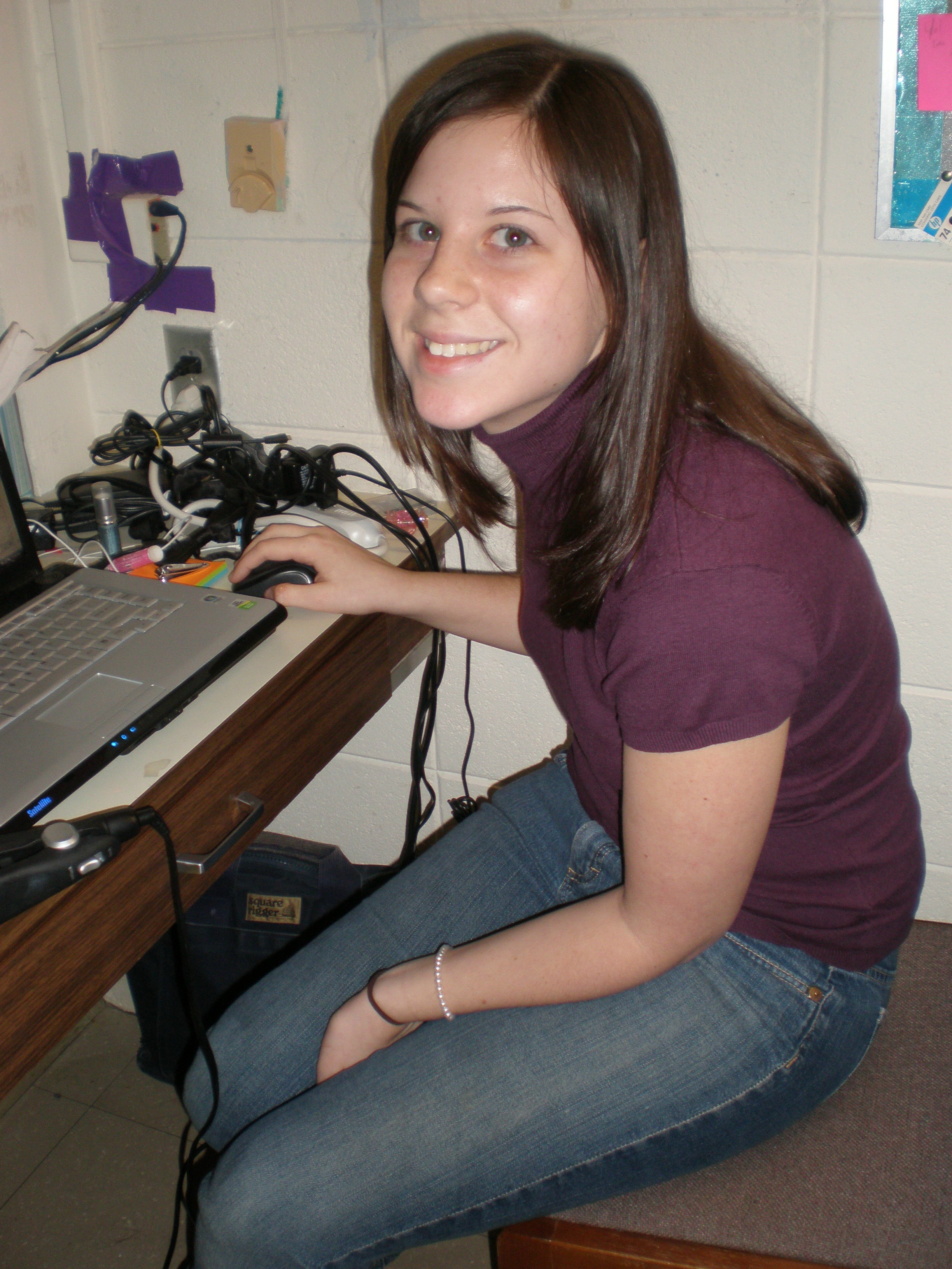 girl sitting in desk - our love story