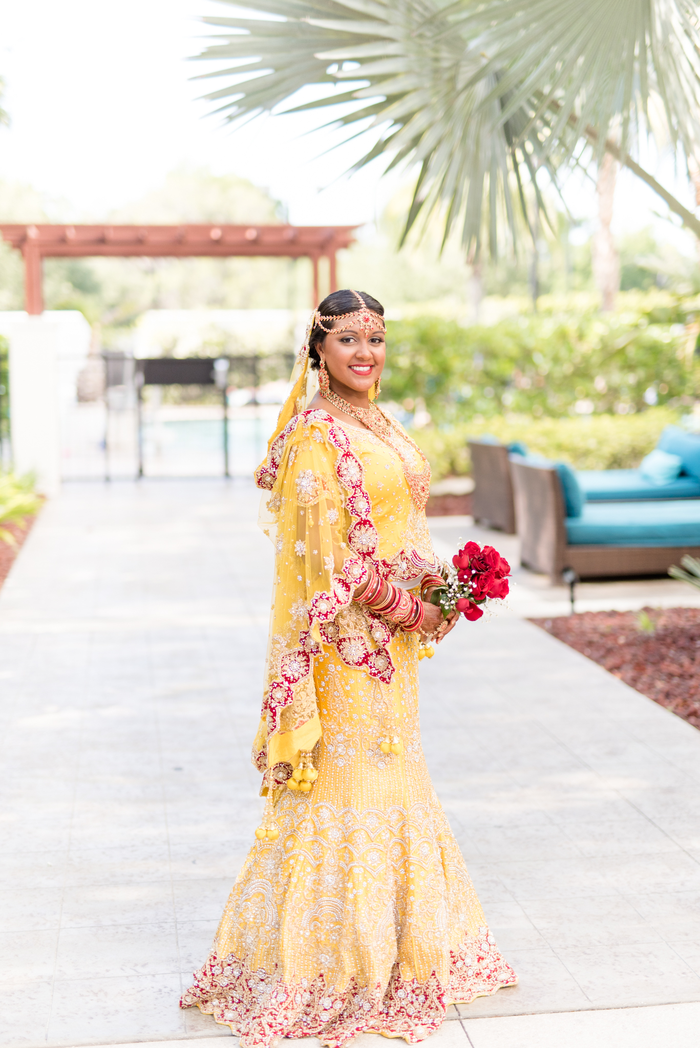 Bride smiles at the camera.