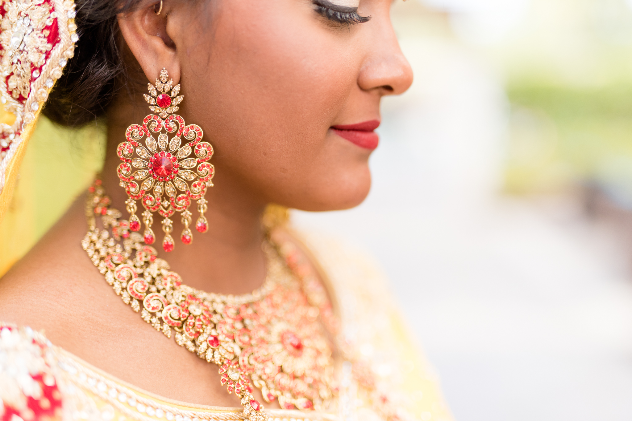 Closeup of bride's earrings.