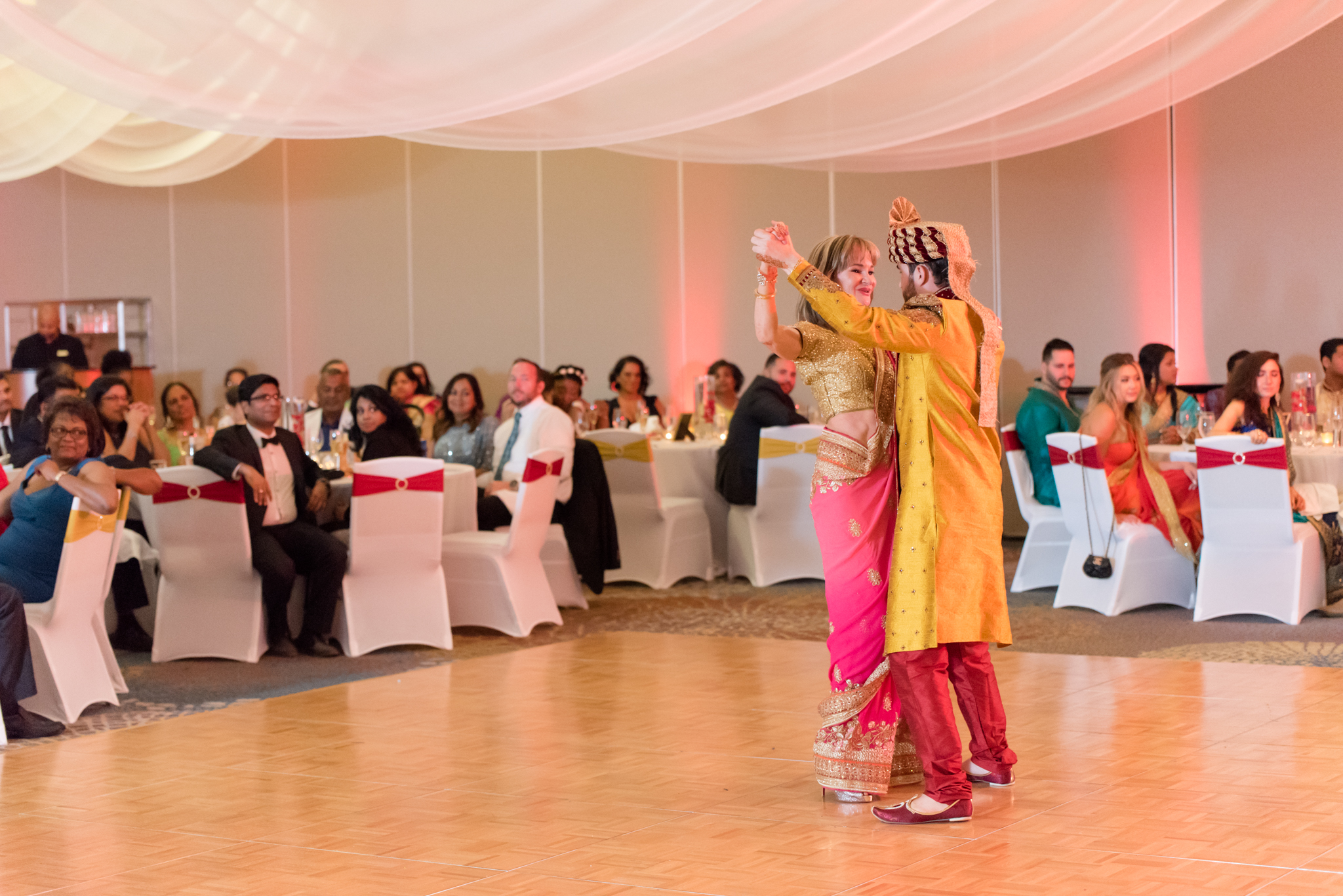 Groom and mother dance.