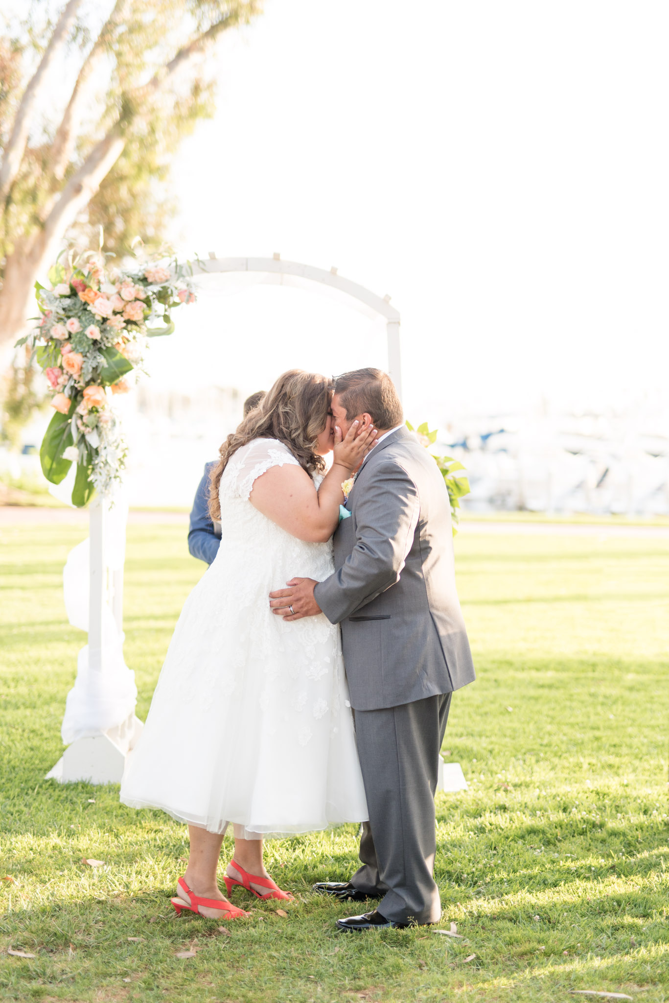 Bride and groom kiss during San Diego wedding