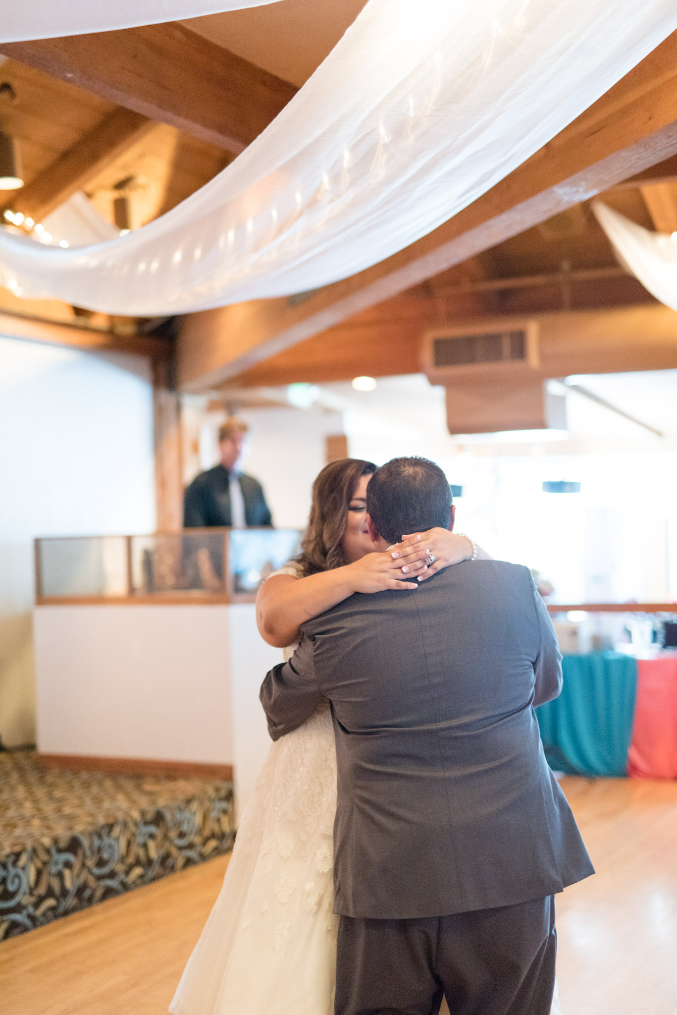 Bride and groom dance.