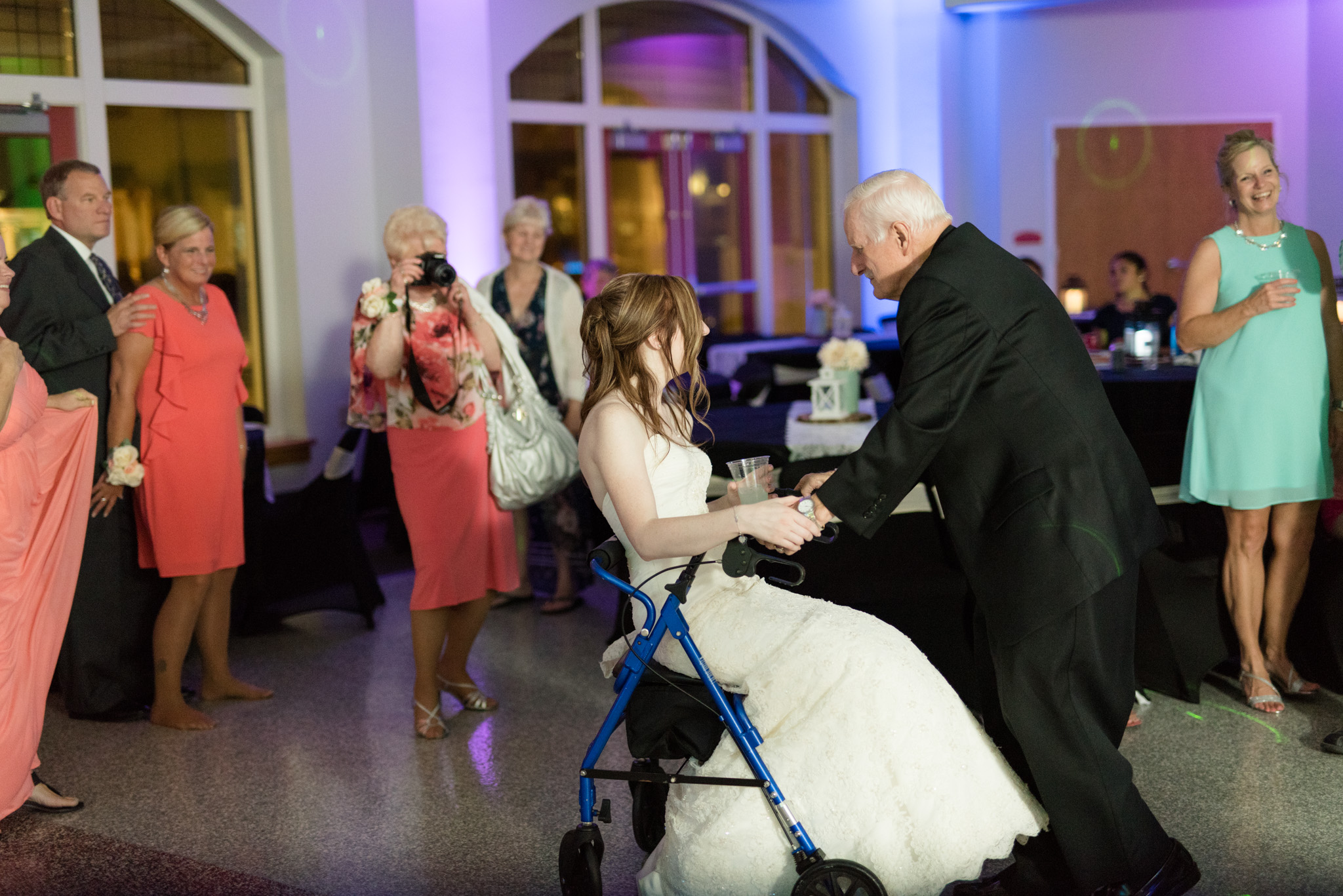Bride and elderly father dance