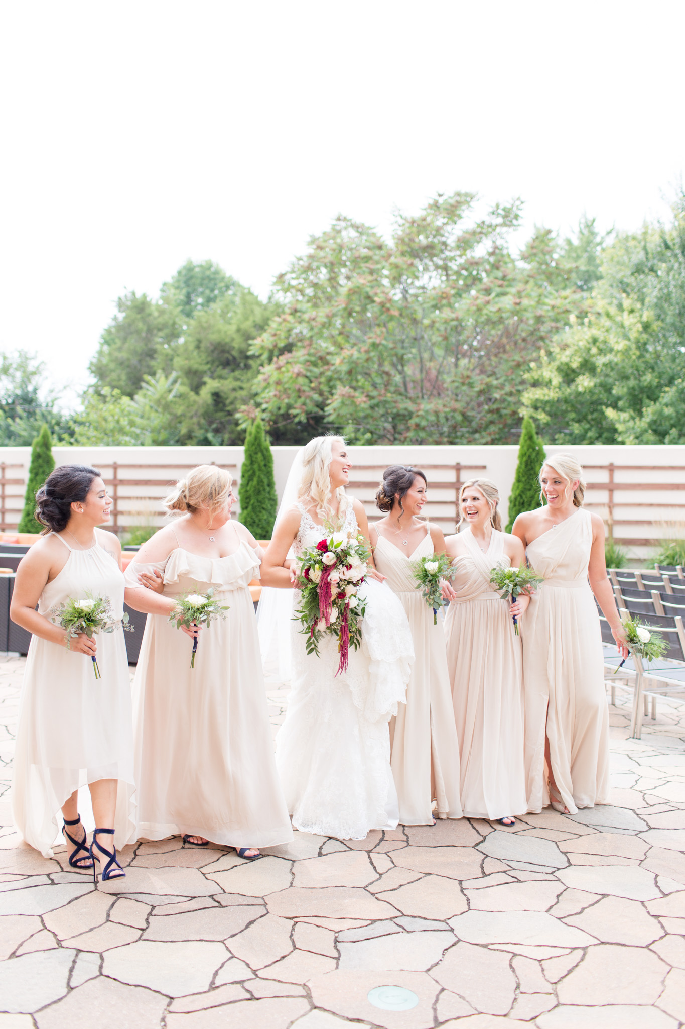 Bridal party walks together.