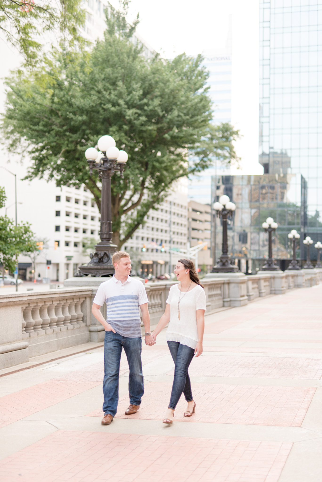 Couple walks along brick path