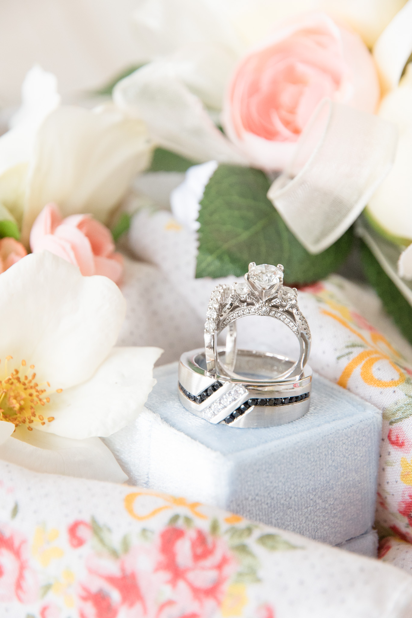 Engagement ring stand on other rings.