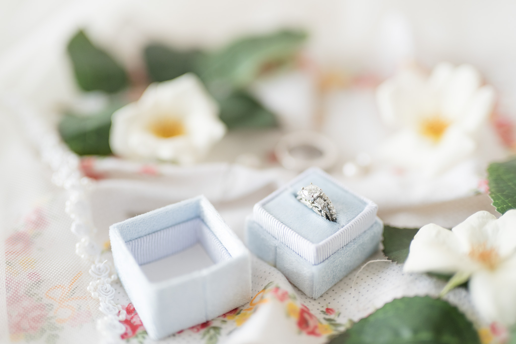 Engagement ring sits in velvet box