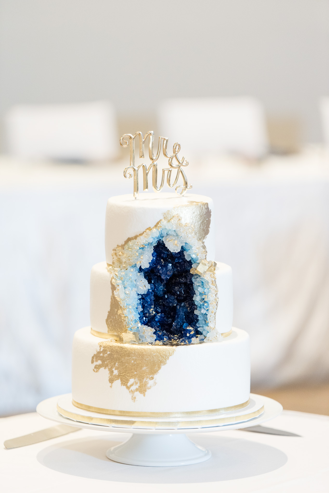 Navy geode wedding cake.