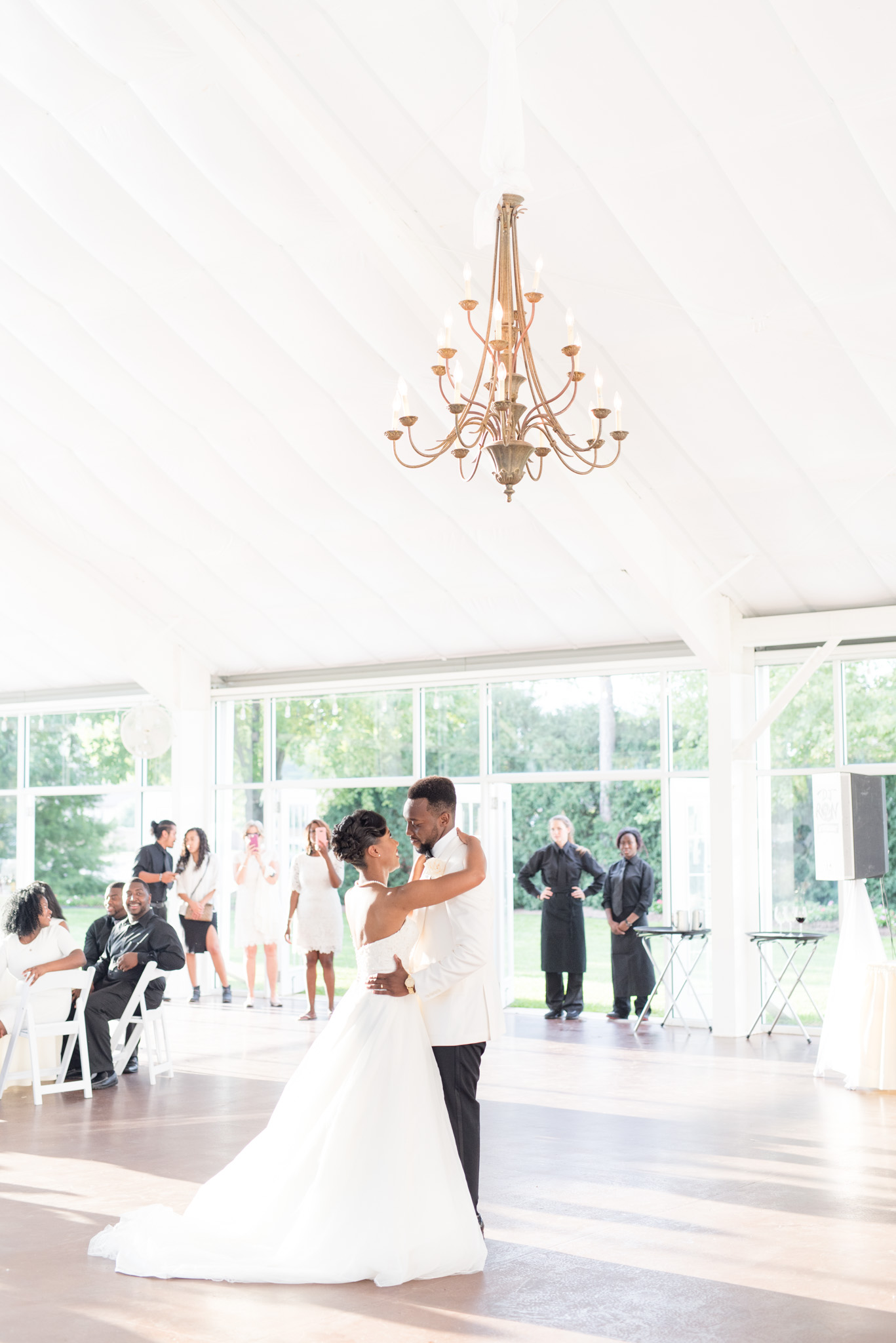 Bride and groom dance at reception.