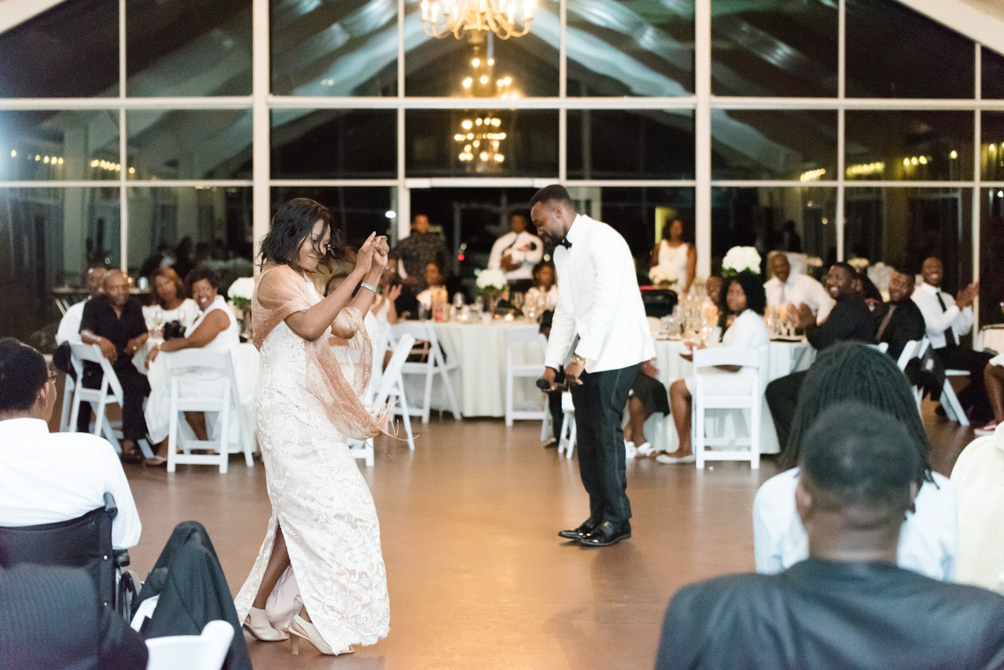 Groom and mother dance.