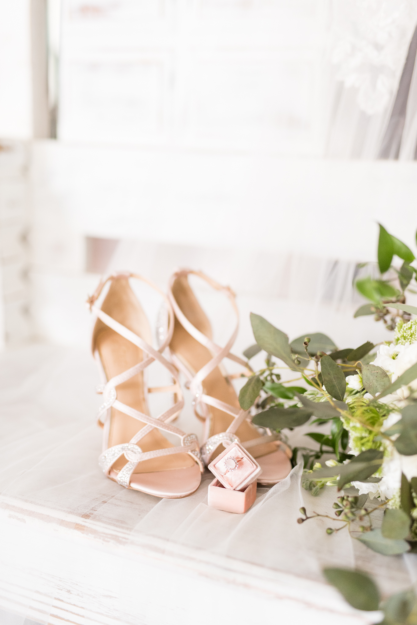 Shoes, wedding ring, and bouquet