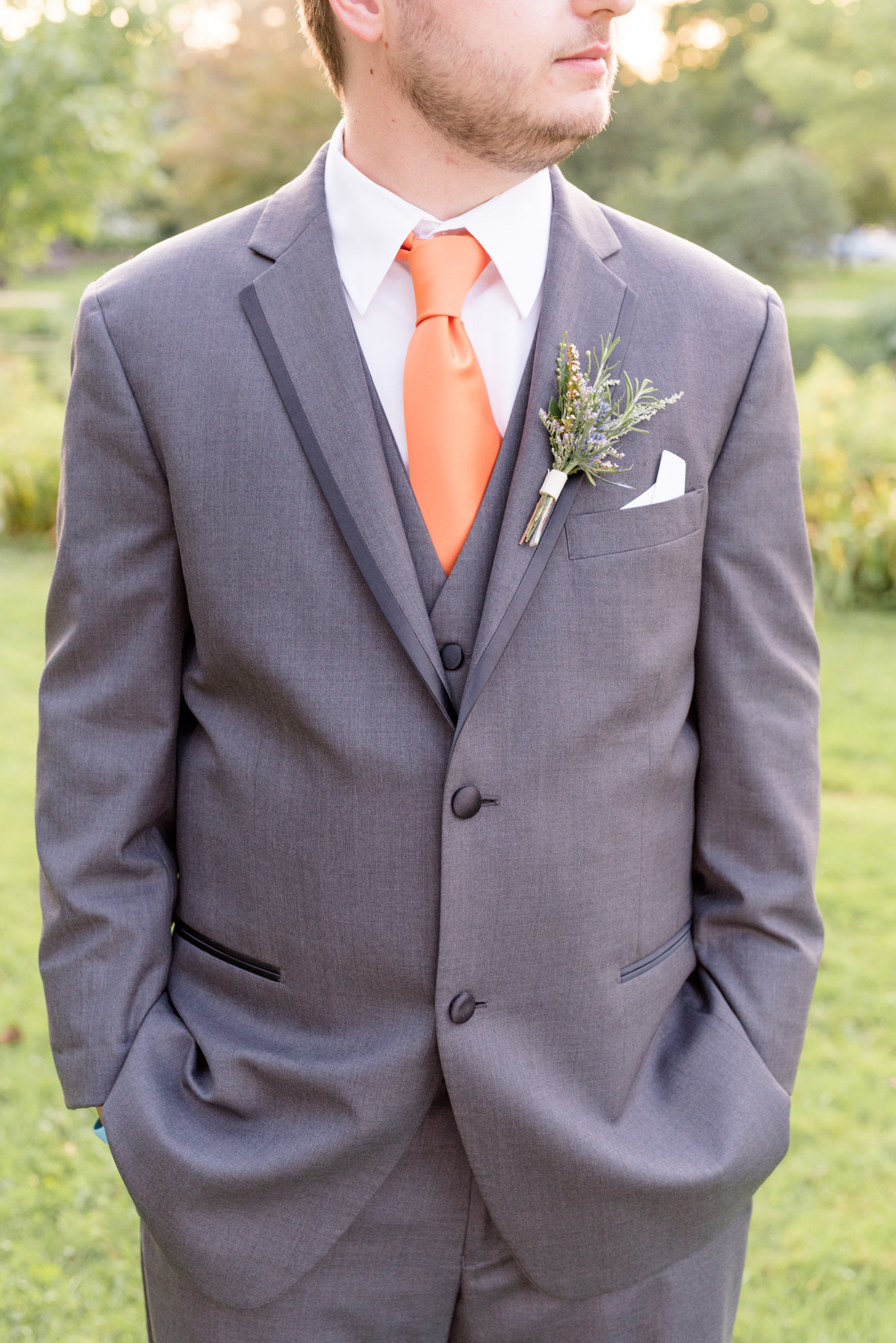 Closeup of groom's attire.