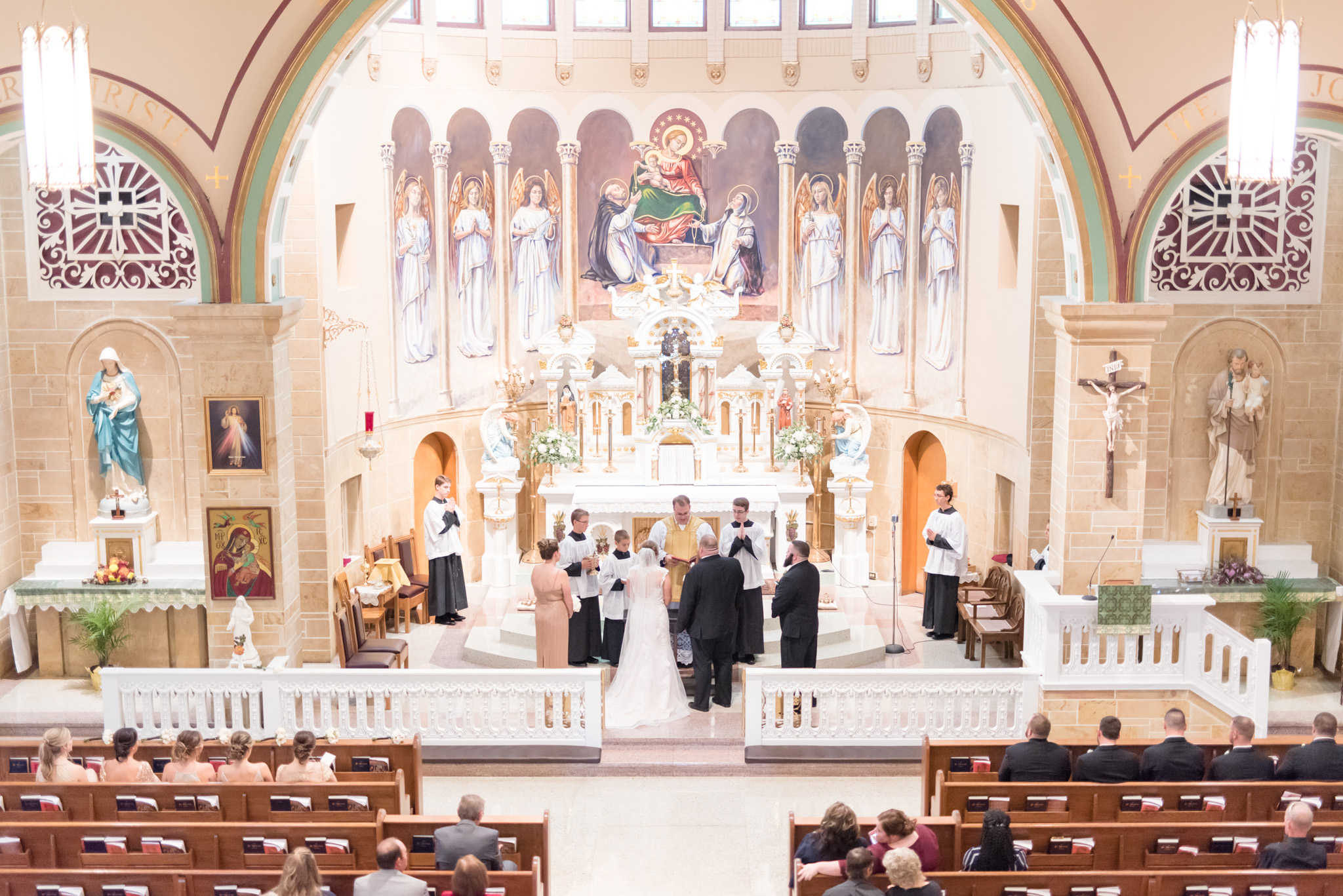 Bride and groom during catholic wedding.