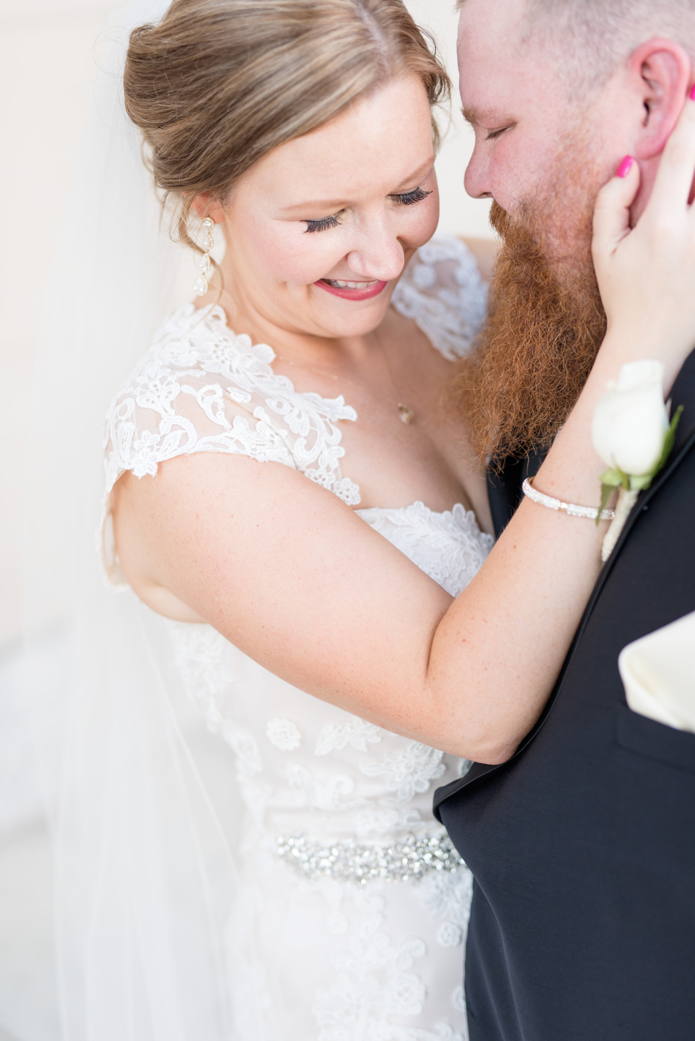 Bride and groom cuddle in downtown Indianapolis wedding.