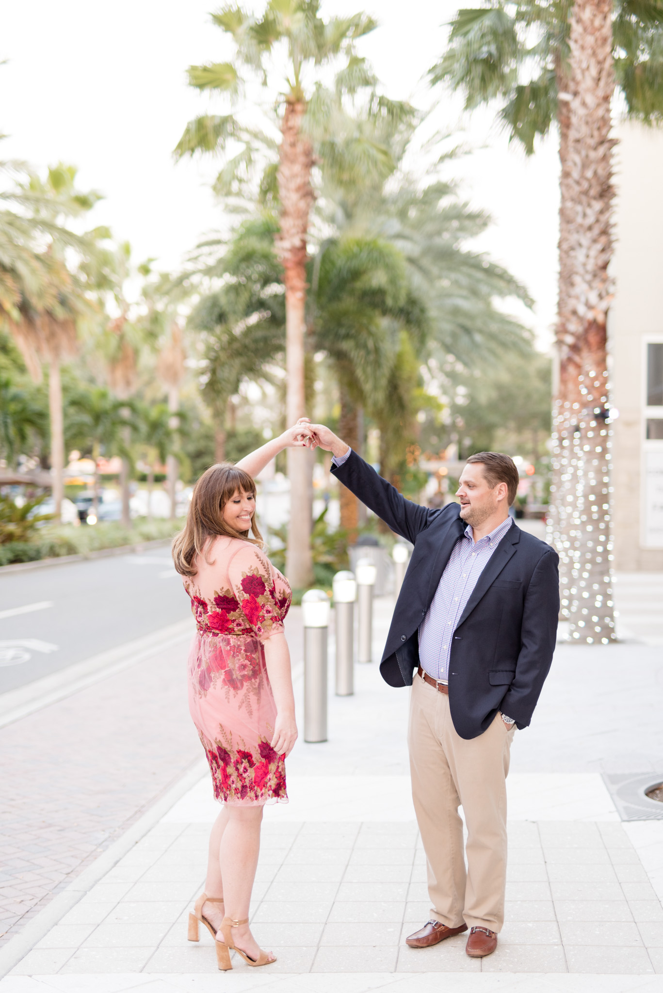 Man twirls his bride-to-be in downtown St. Pete