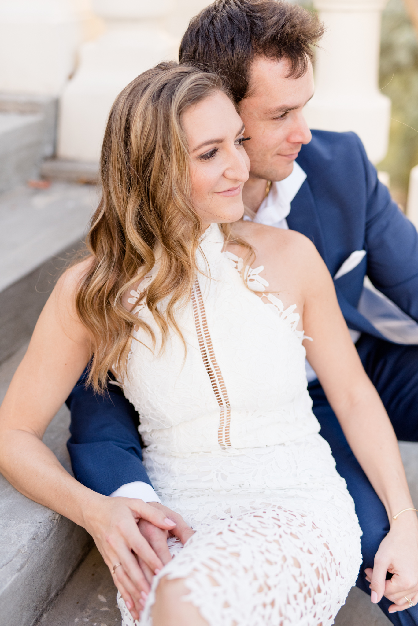 Couple sits together.